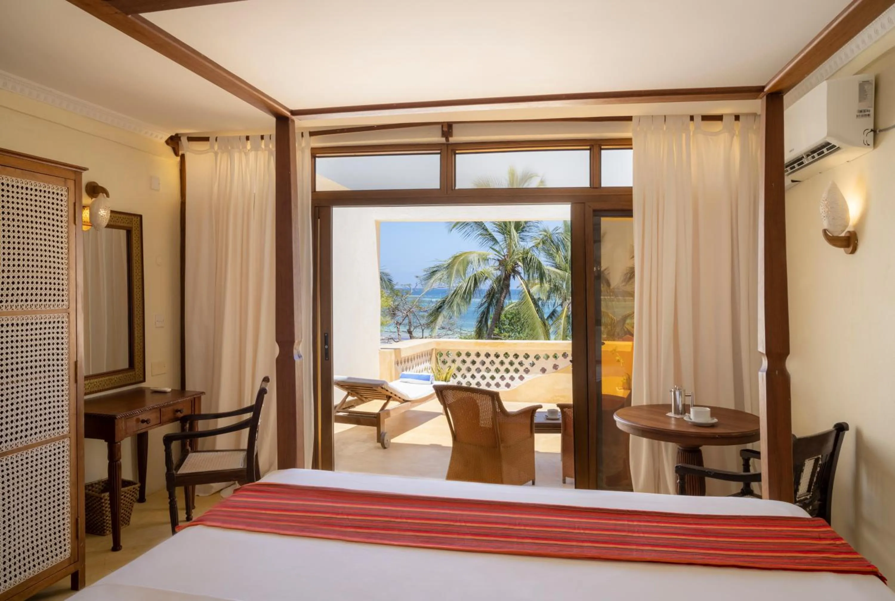 Bed in Blue Marlin Beach Hotel