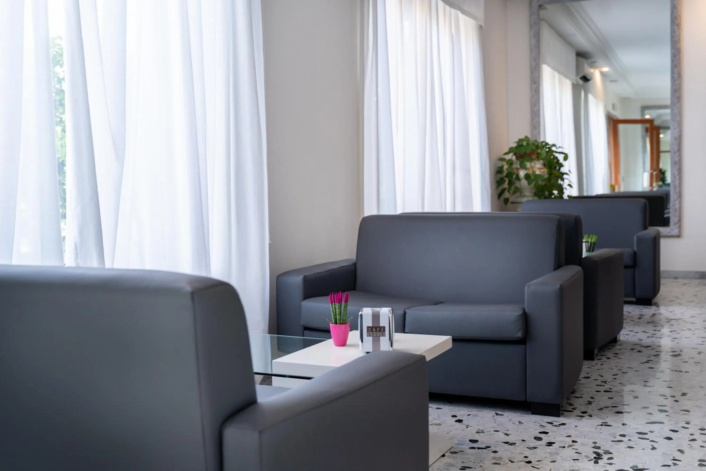 Lobby or reception in Hotel La Pergola