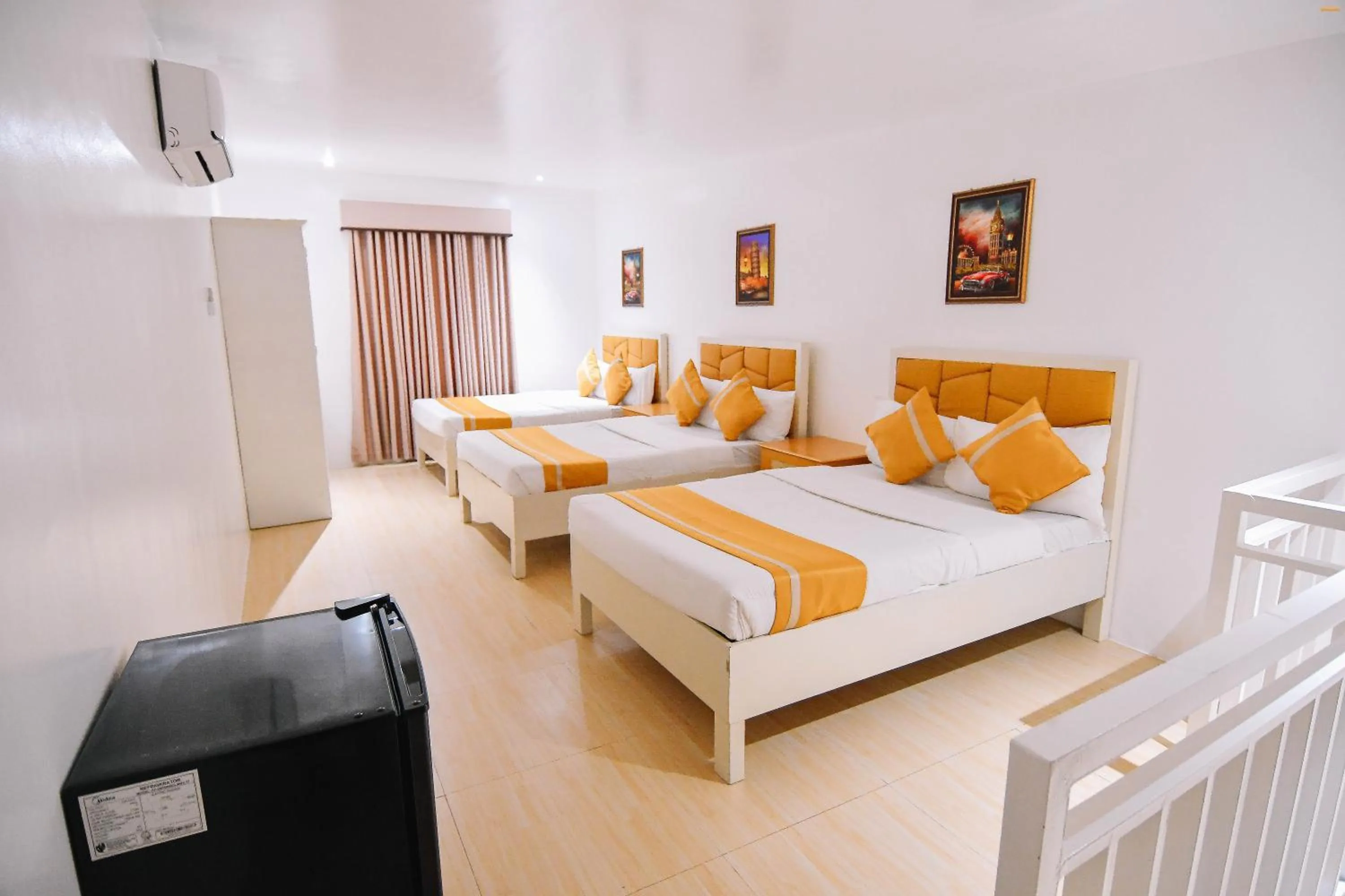 Bed in Villa Excellance Beach and Wave Pool Resort