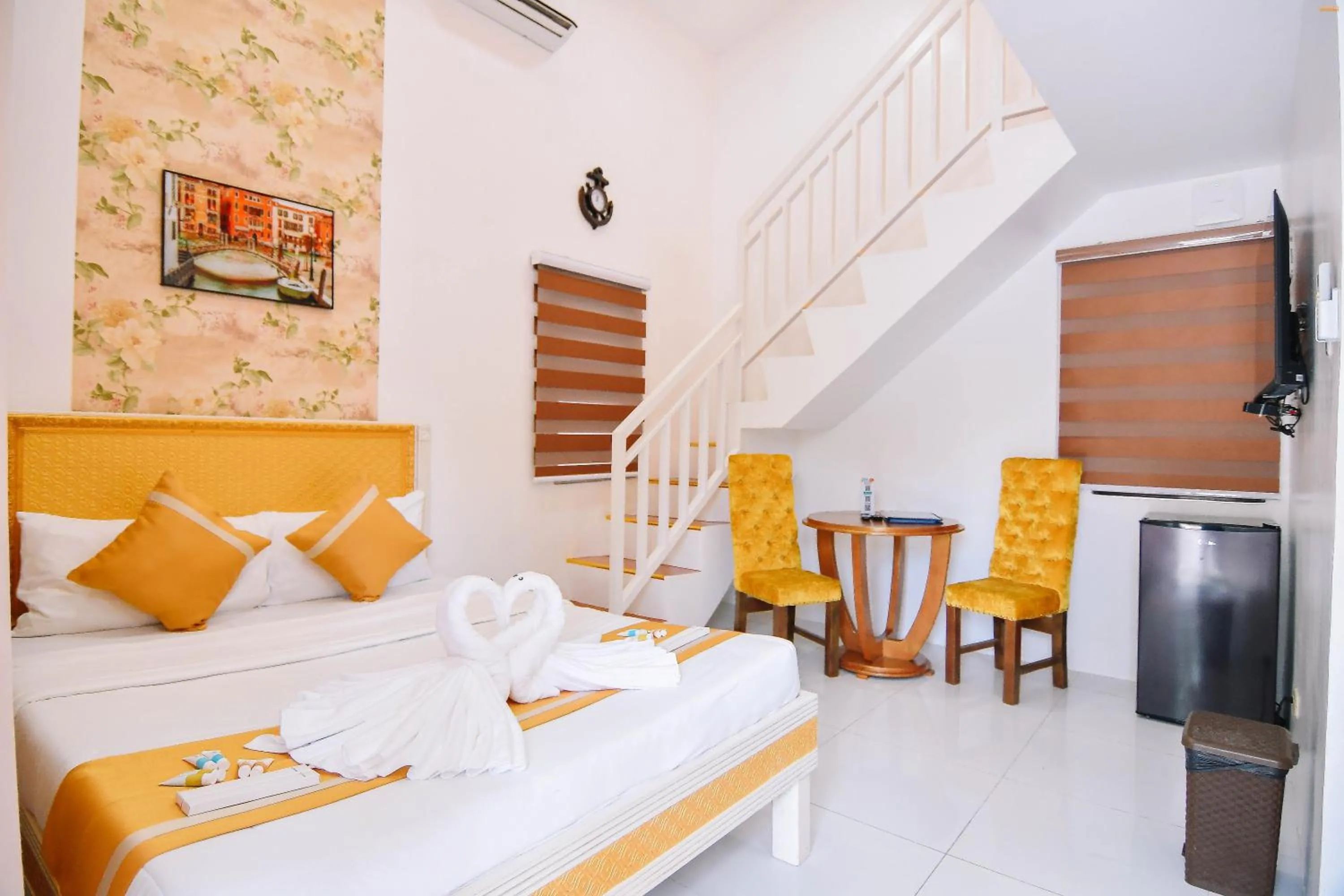 Bed in Villa Excellance Beach and Wave Pool Resort