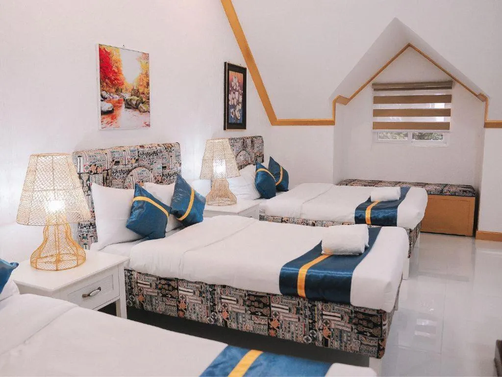 Bed in Villa Excellance Beach and Wave Pool Resort