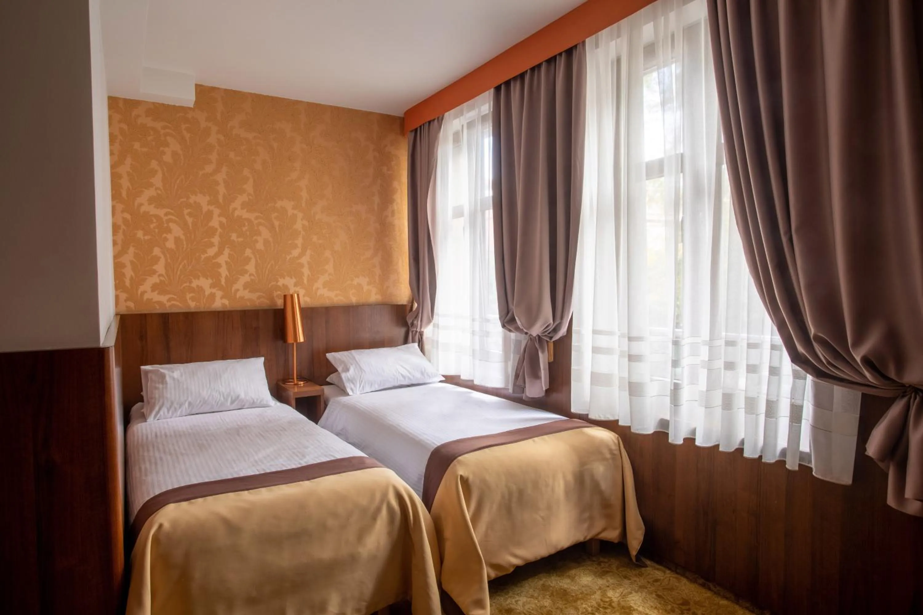 Bed in David Boutique Hotel