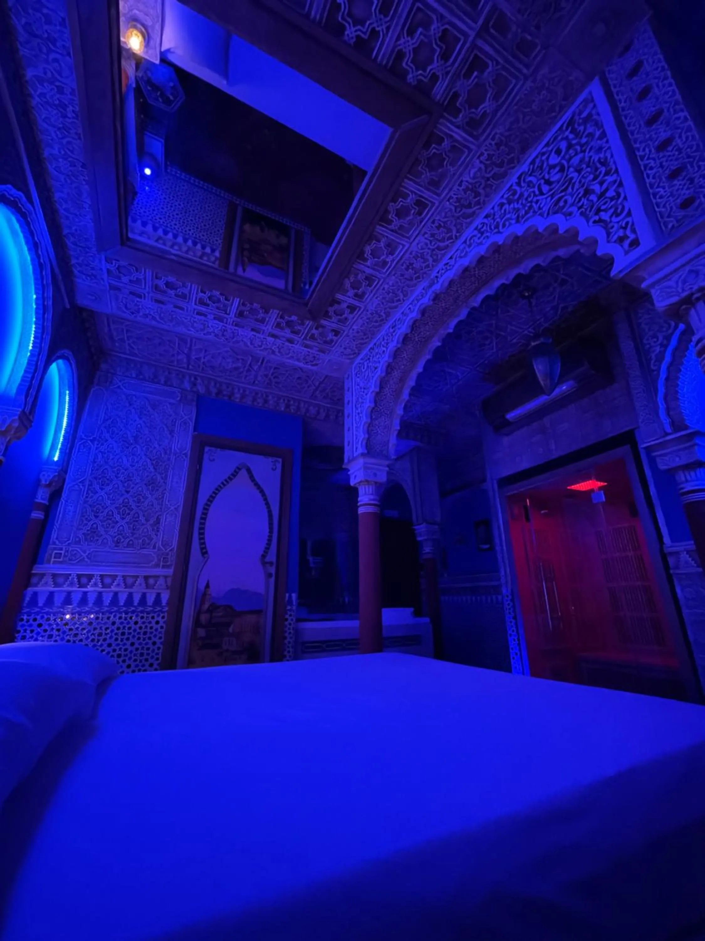 Bed in MagicSuite Guest House Roma Vaticano