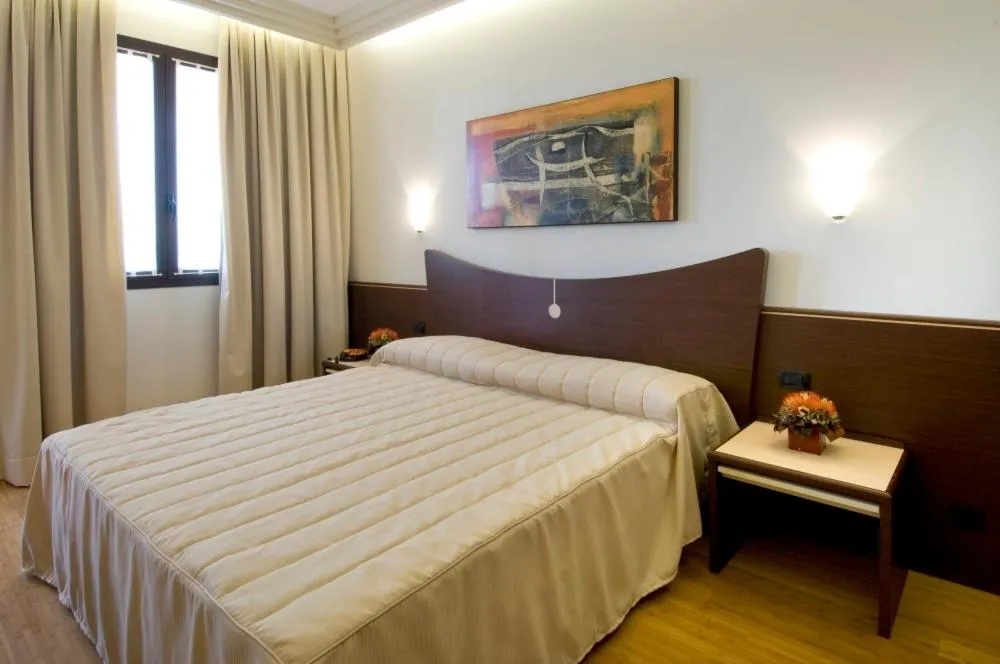 Photo of the whole room, Bed in As Hotel Cambiago