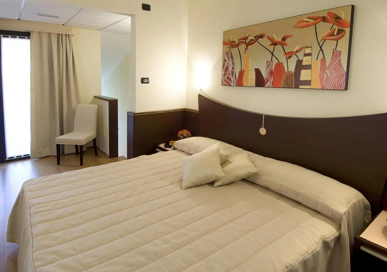 Photo of the whole room, Bed in As Hotel Cambiago