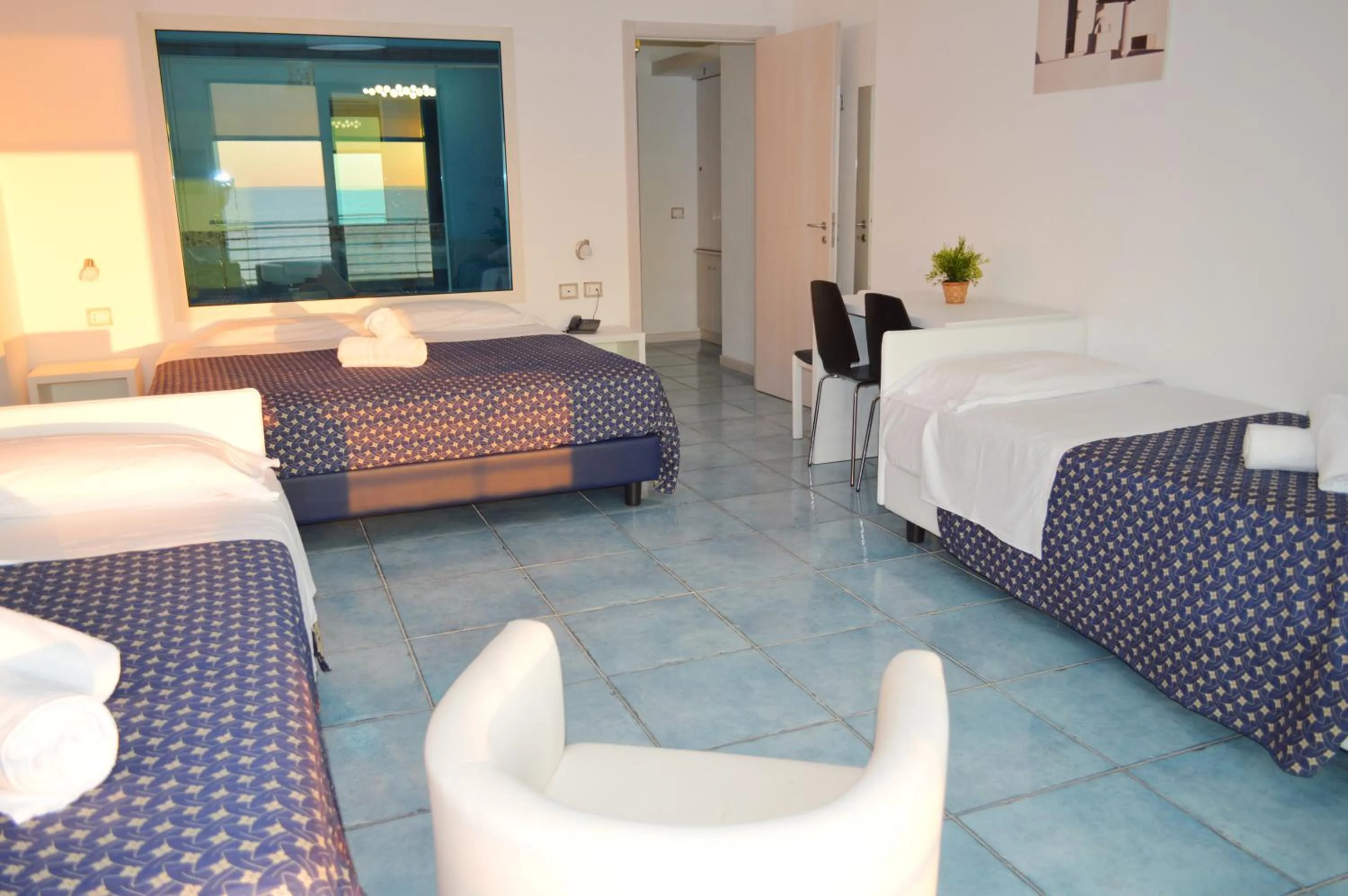 Bedroom in Capo Nettuno Hotel