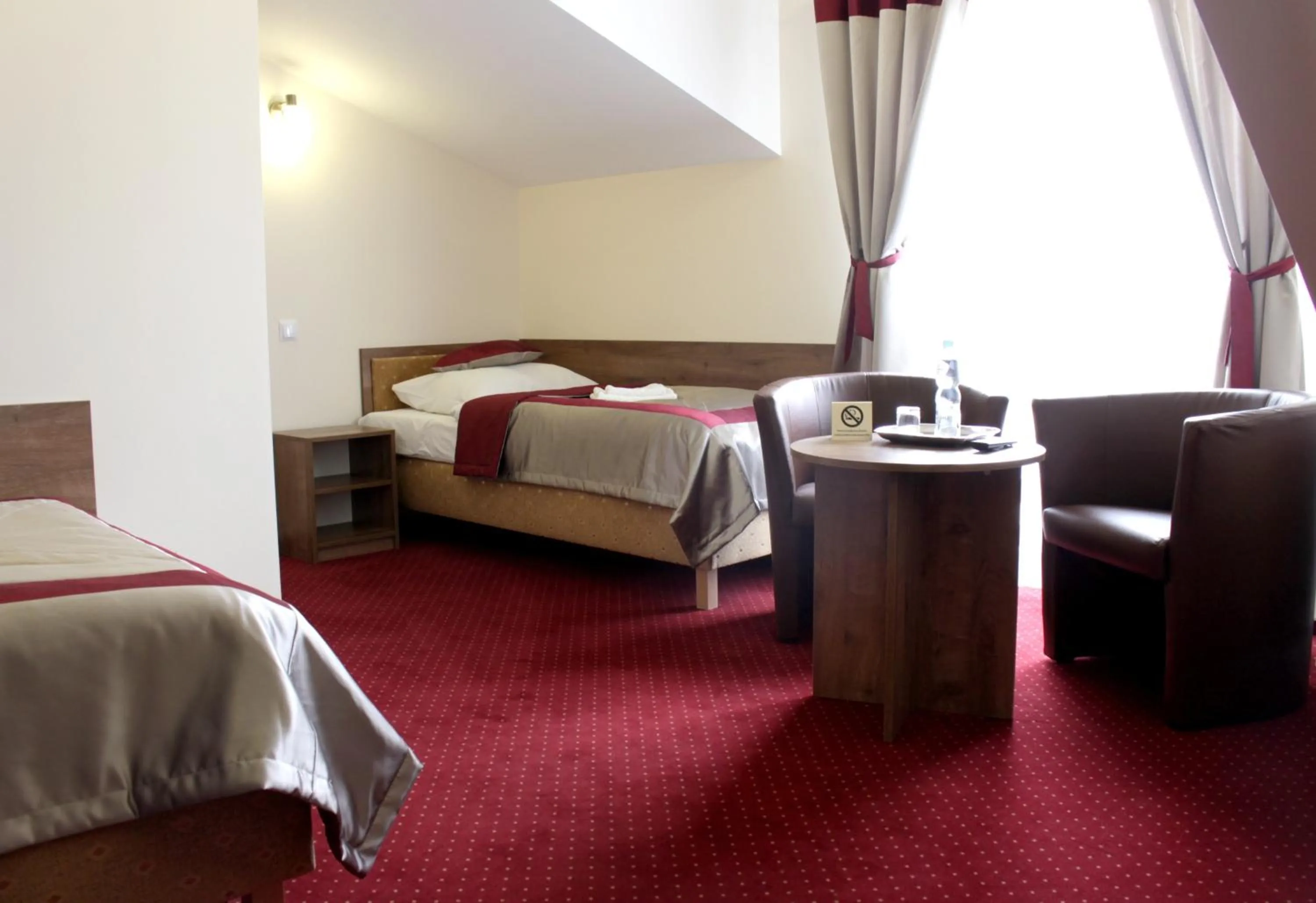 Bed in Hotel Dukat