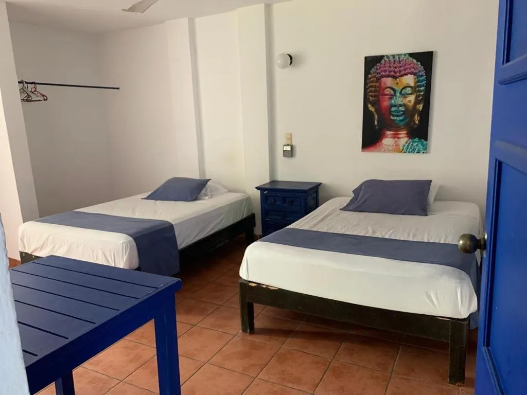 Photo of the whole room, Bed in MayFlower Hotel & Hostal