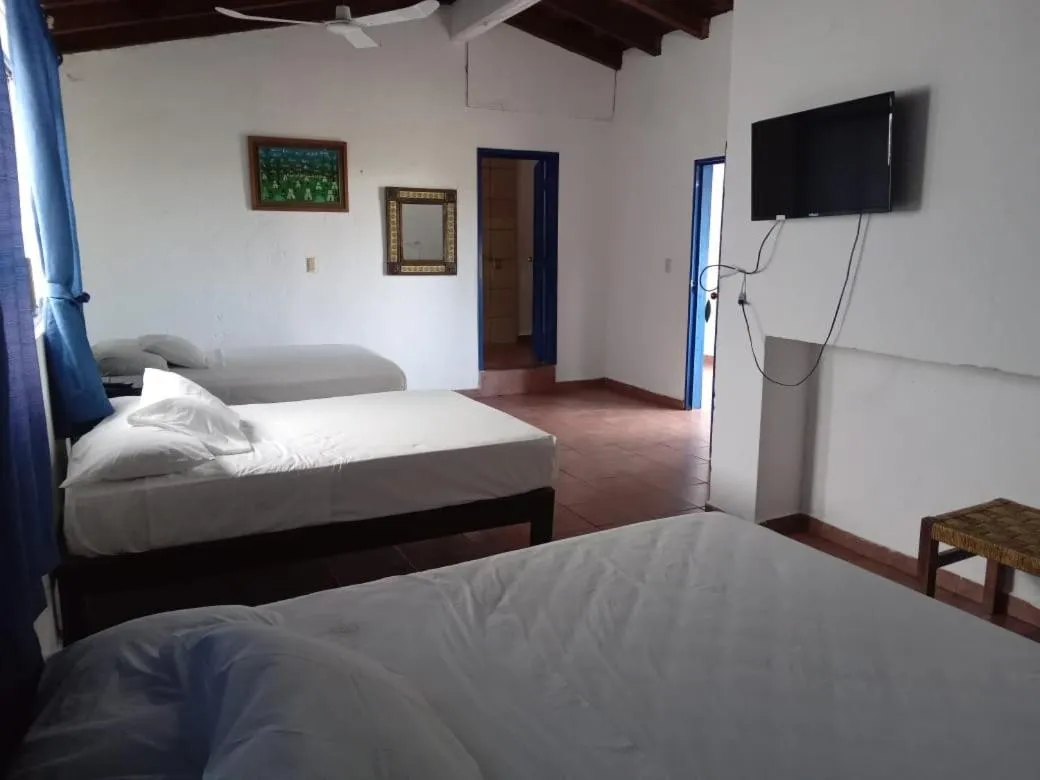 Photo of the whole room, Bed in MayFlower Hotel & Hostal