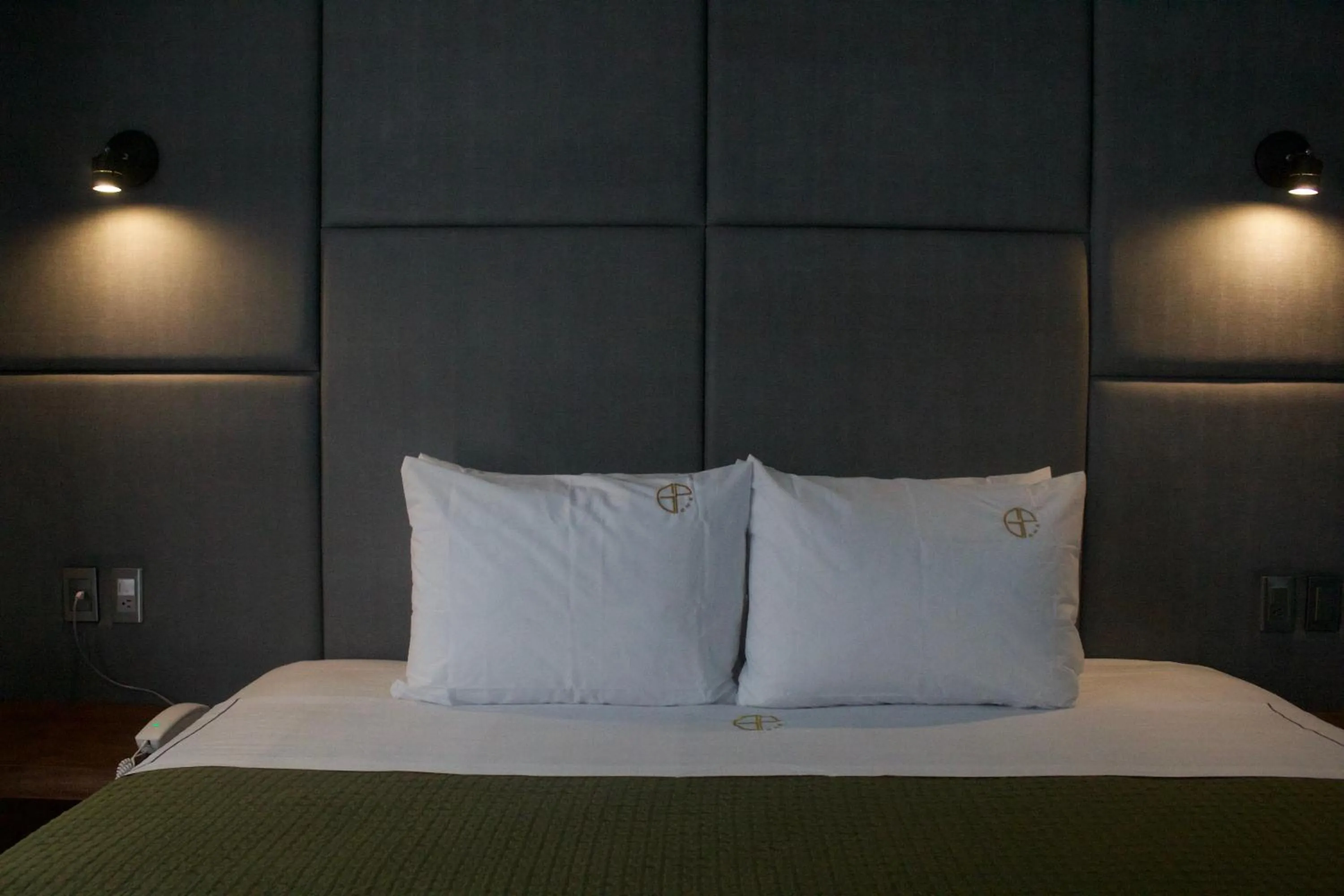 Bed in Hotel Grand One Plaza