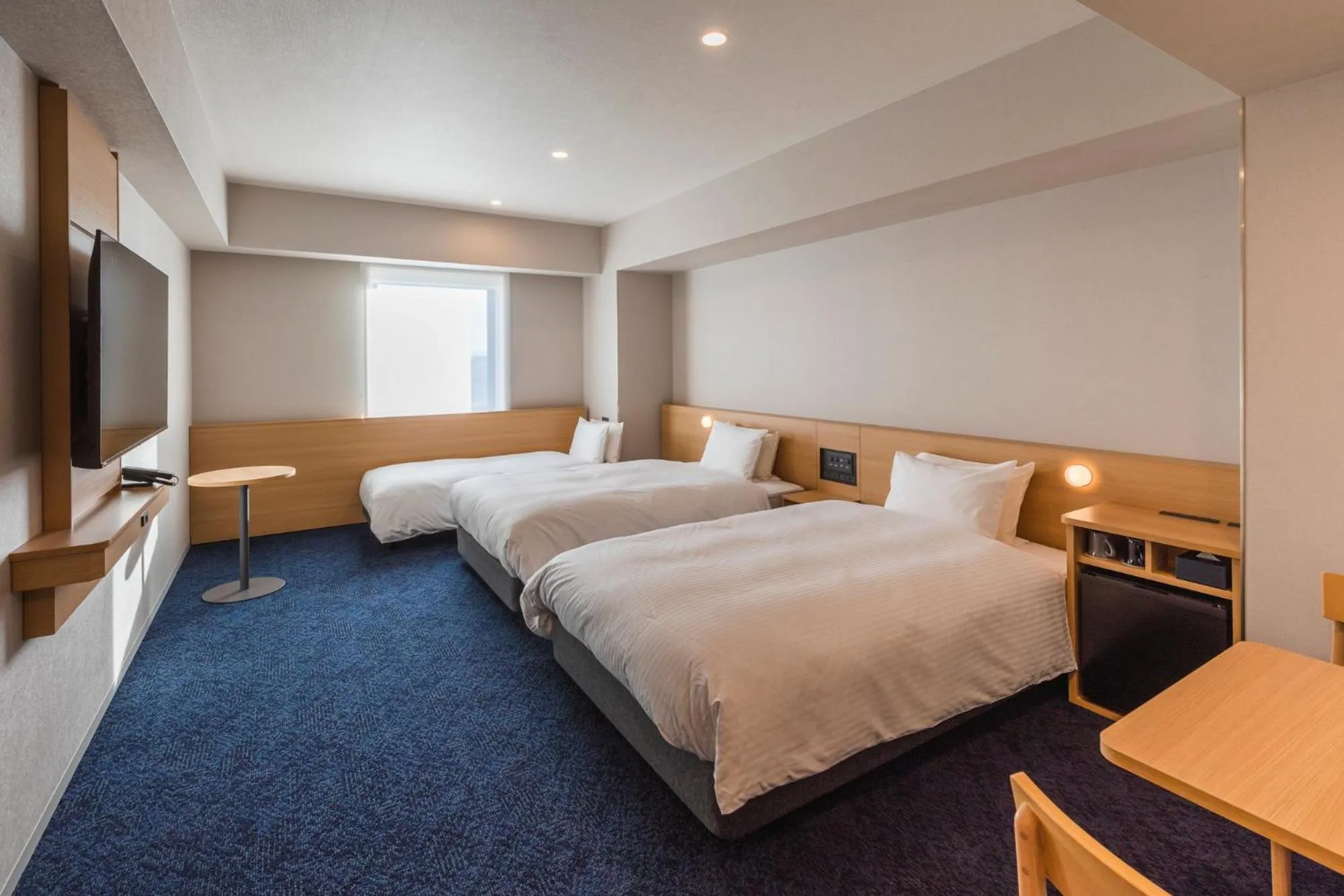 Photo of the whole room, Bed in Sotetsu Grand Fresa Kumamoto