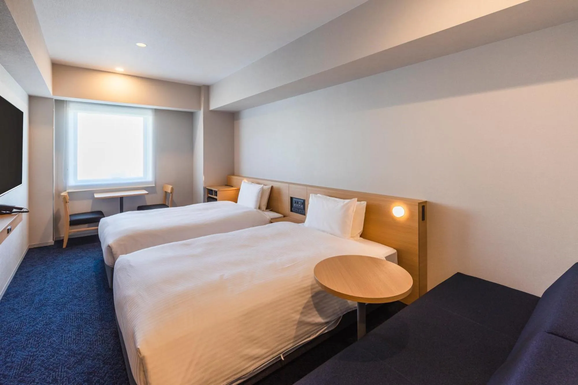 Photo of the whole room, Bed in Sotetsu Grand Fresa Kumamoto