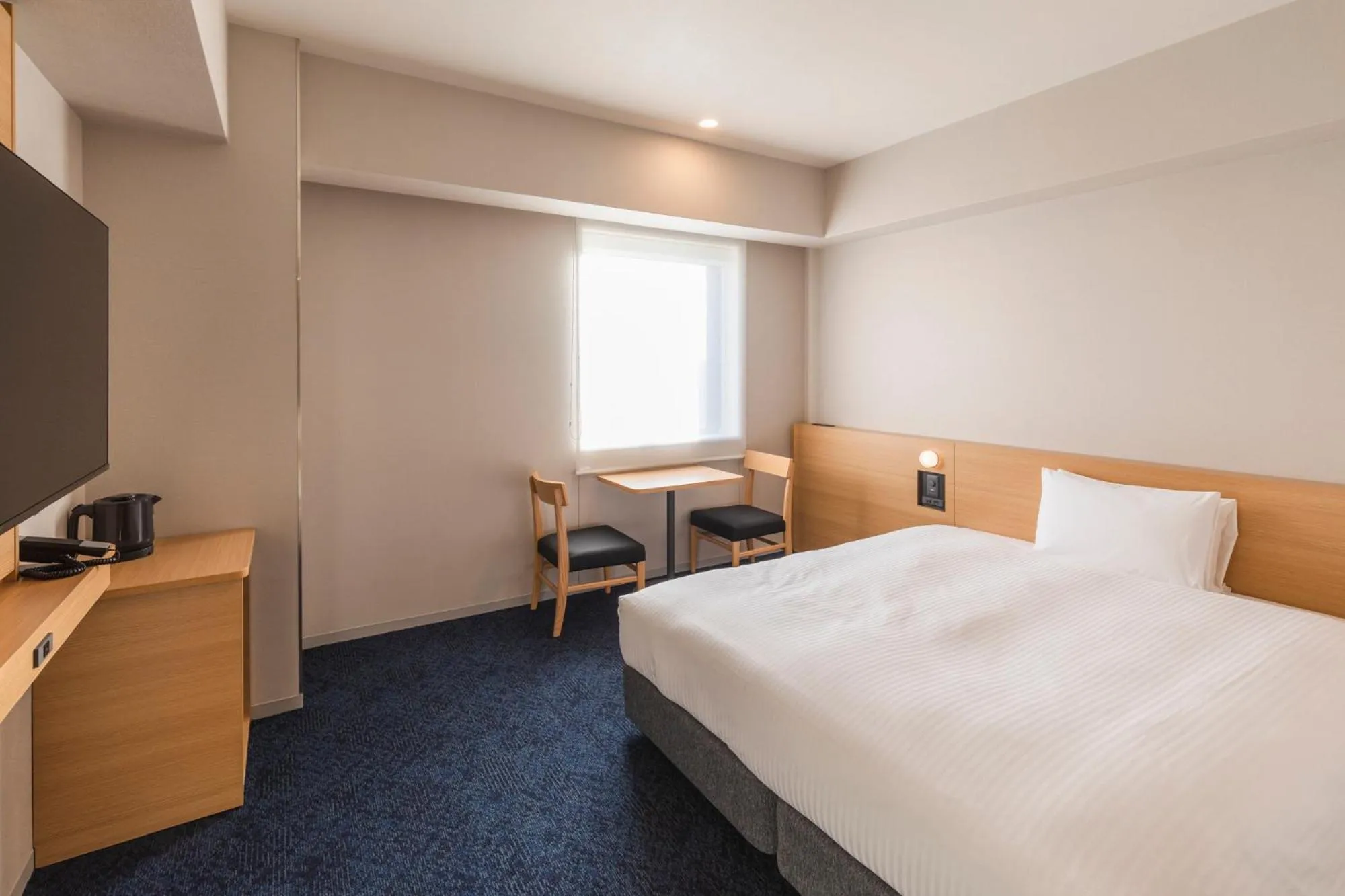 Photo of the whole room, Bed in Sotetsu Grand Fresa Kumamoto