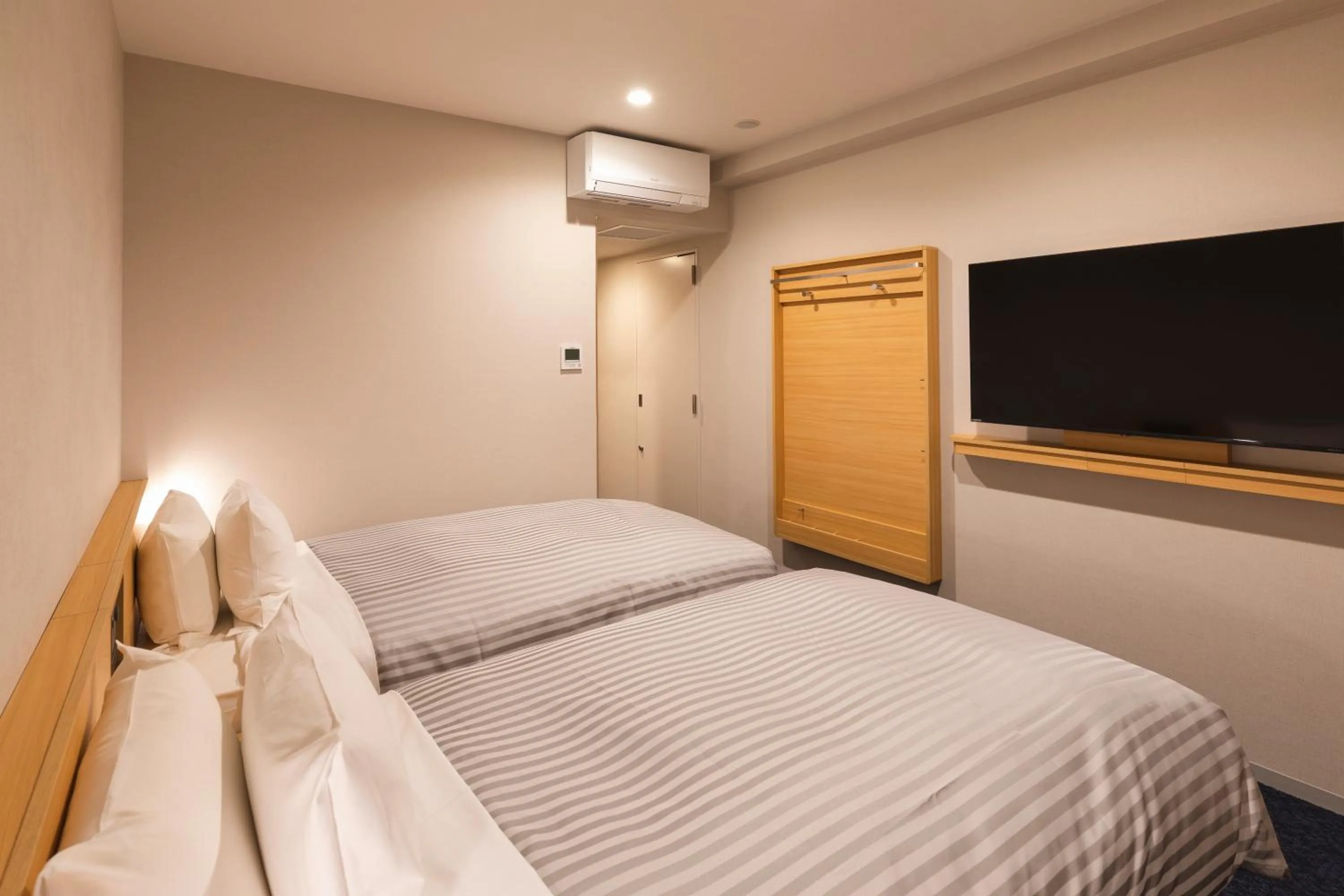 Bed in Sotetsu Grand Fresa Kumamoto