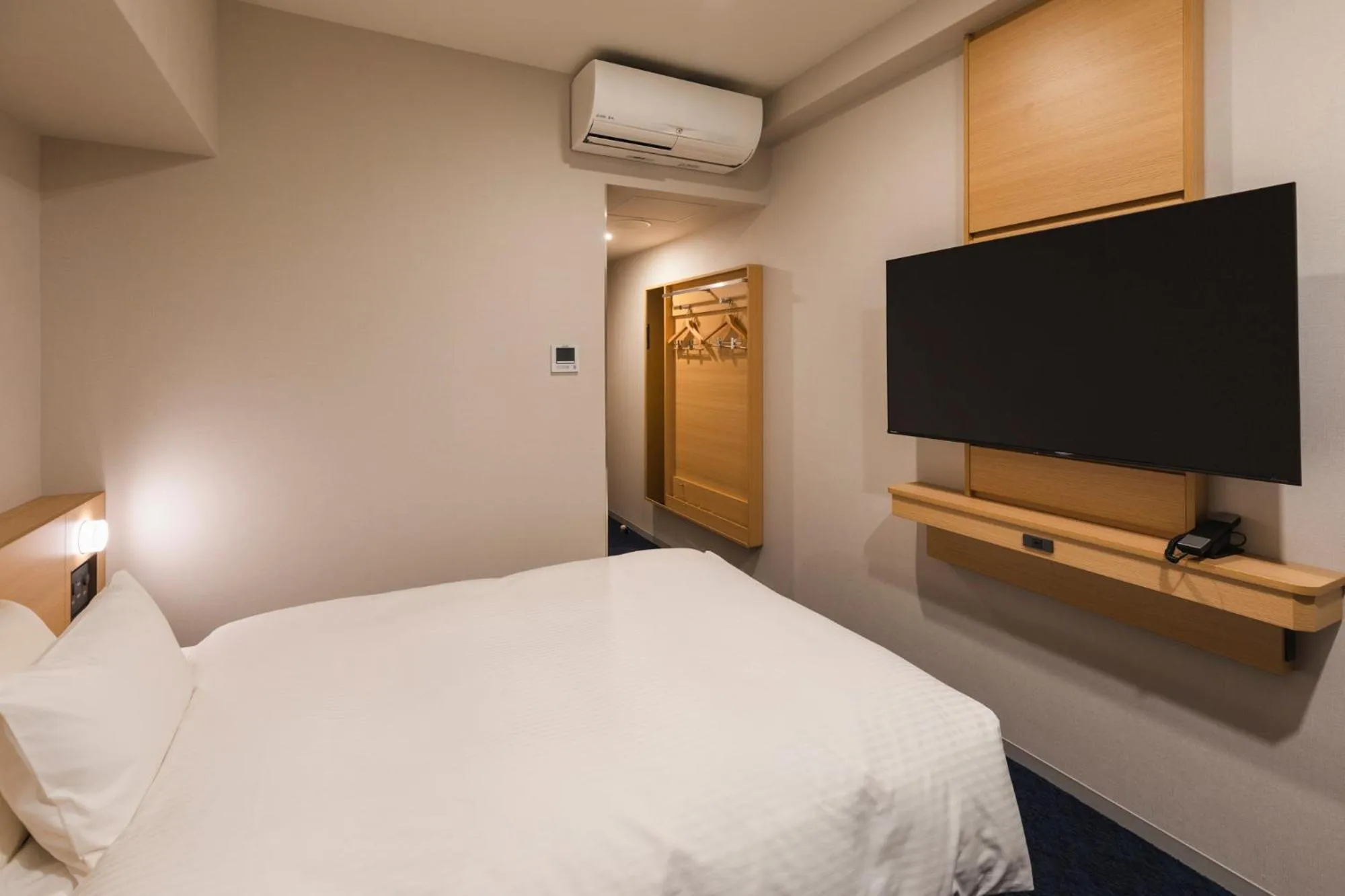 Bed in Sotetsu Grand Fresa Kumamoto