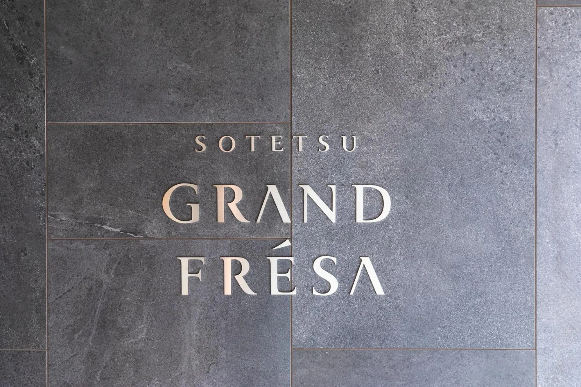 Text overlay in Sotetsu Grand Fresa Kumamoto