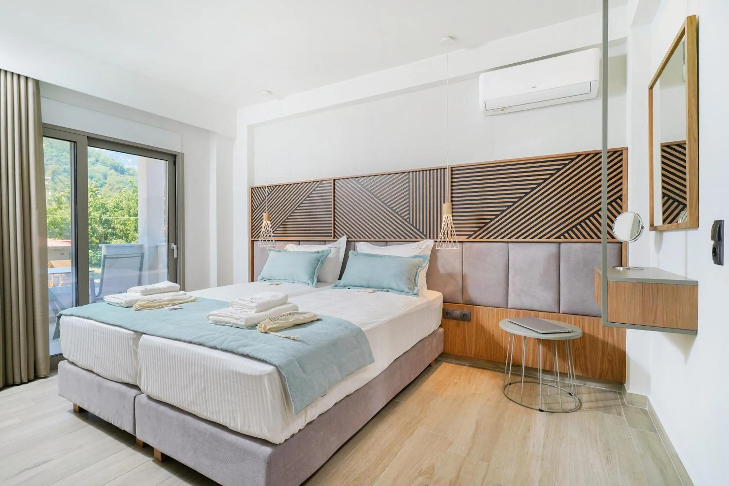Bed in Elisavet Nuevo Studios & Suites