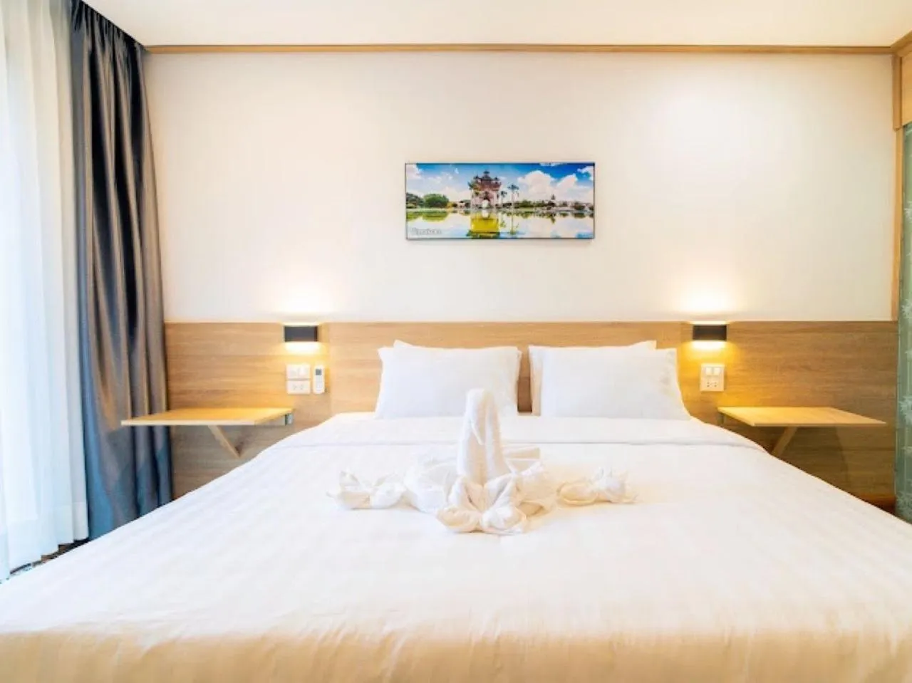 Bed in New Champa Boutique Hotel