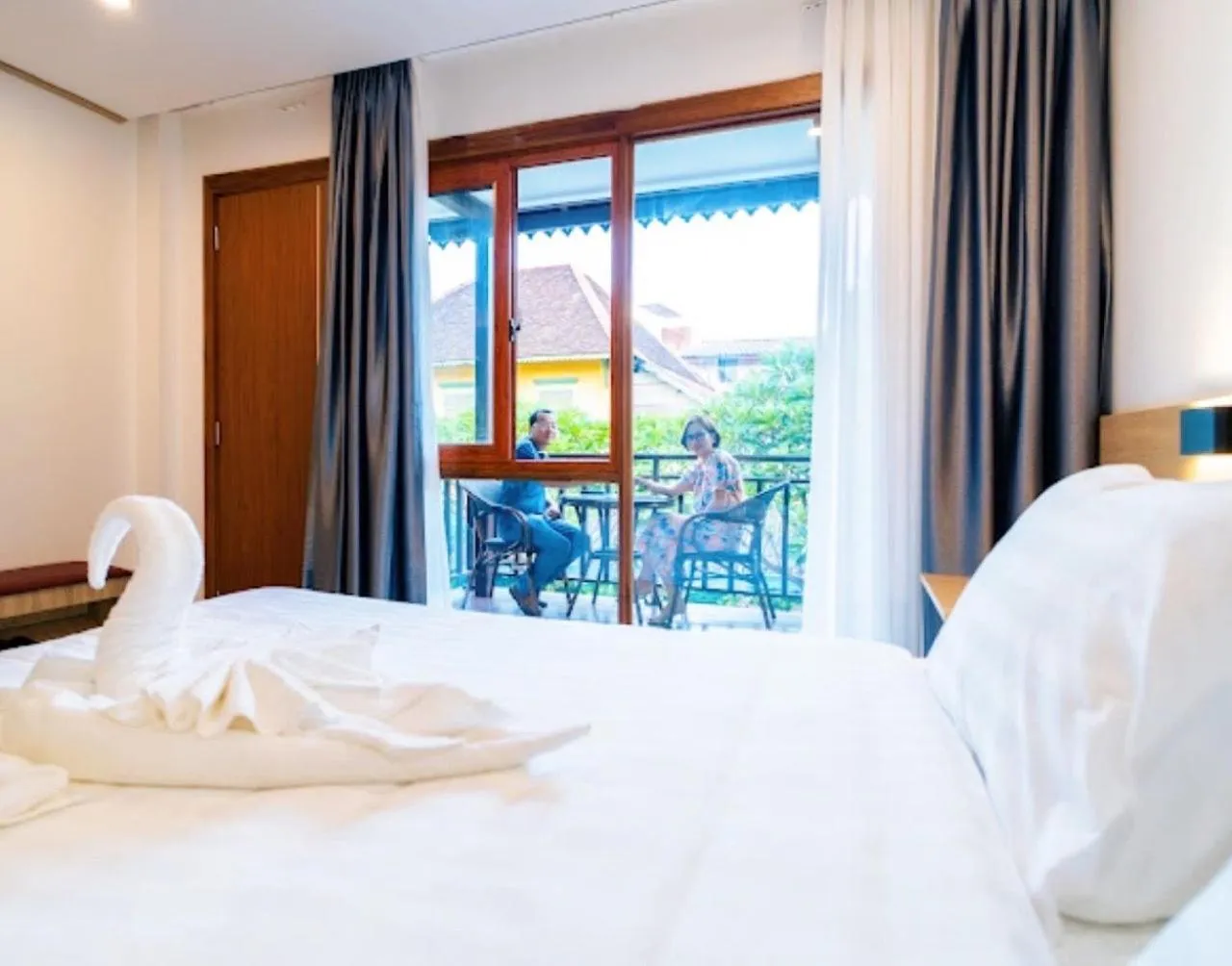 Bed in New Champa Boutique Hotel