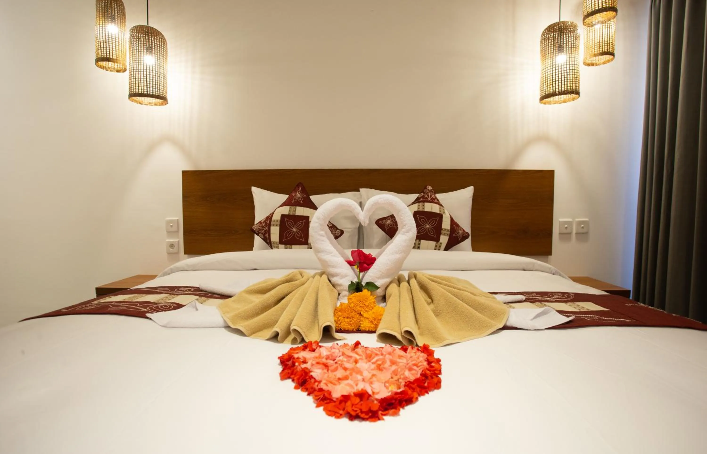 Bed in The Kd Suites & Coffee Shop