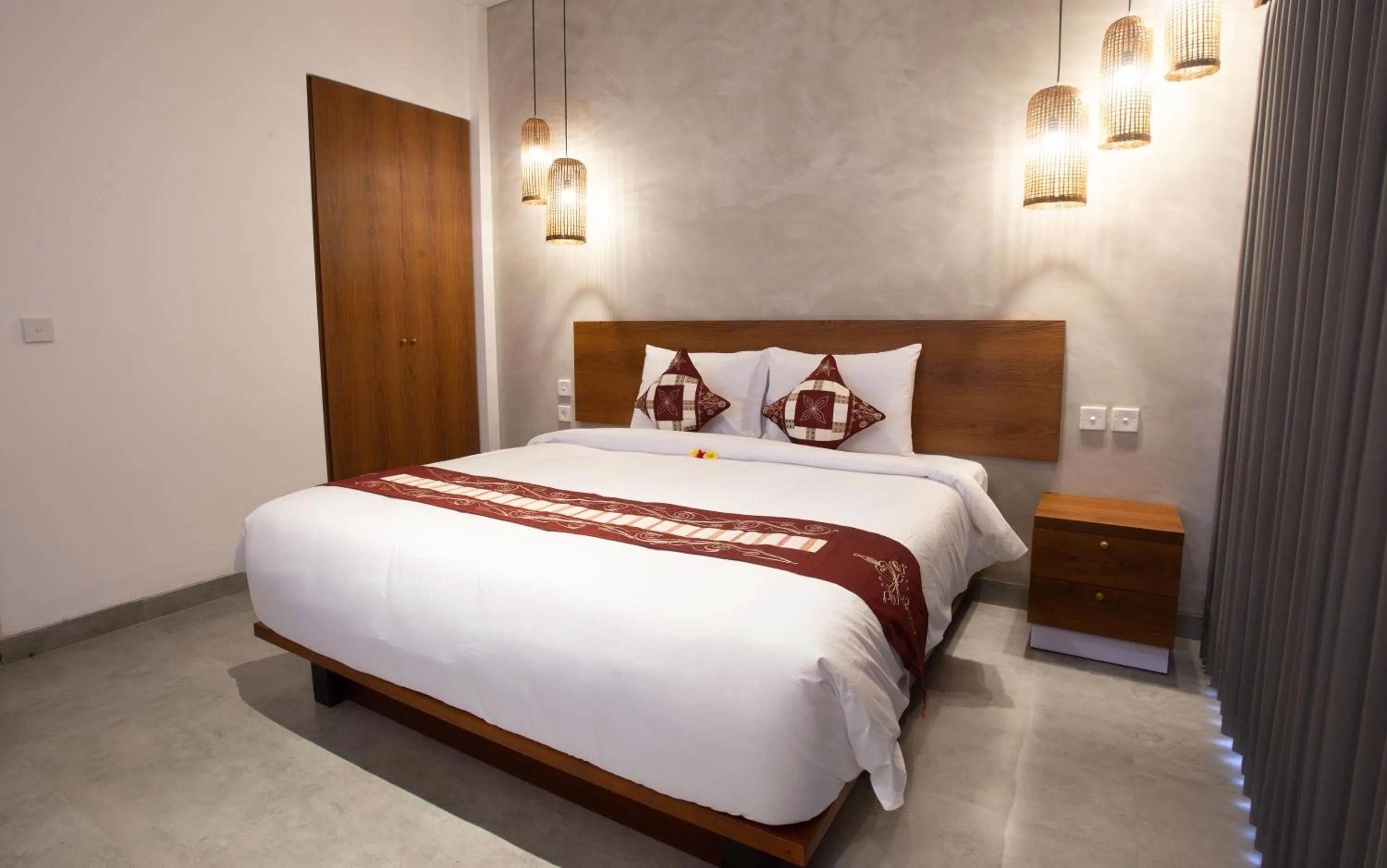 Bed in The Kd Suites & Coffee Shop