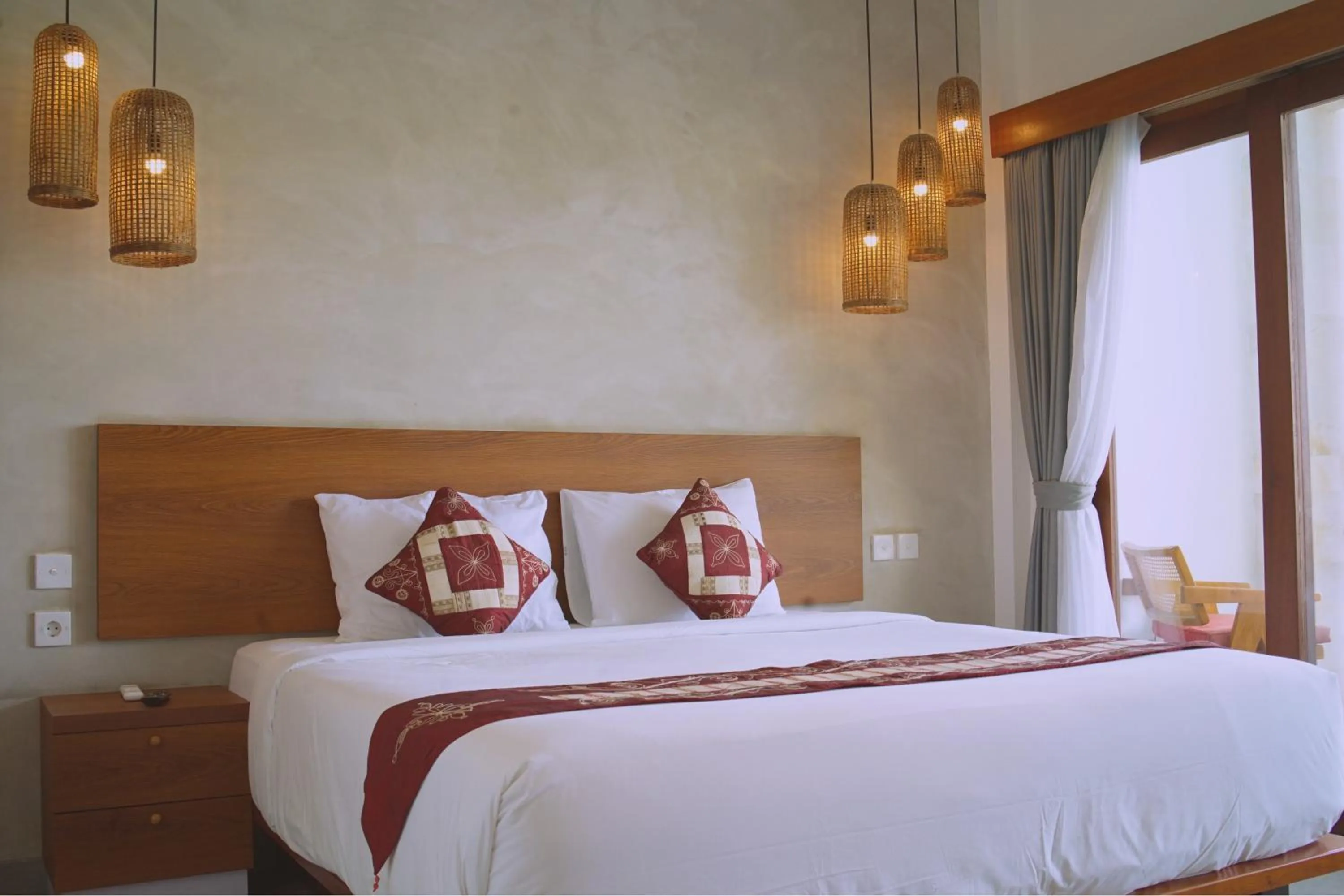 Bed in The Kd Suites & Coffee Shop