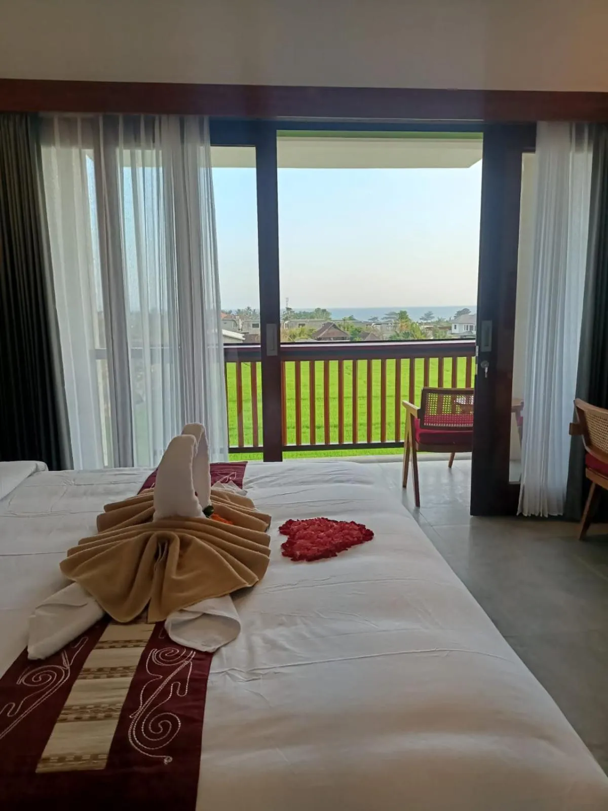 Bed in The Kd Suites & Coffee Shop