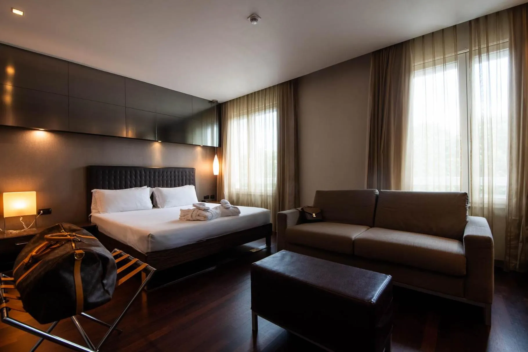 Bed in Axolute Comfort Hotel Como Cantù