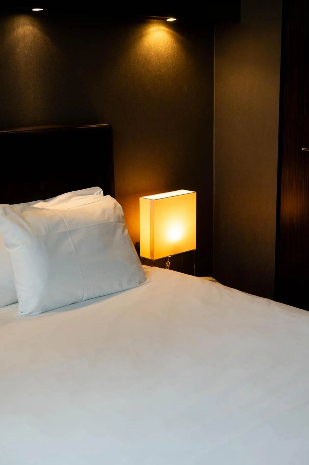 Bed in Axolute Comfort Hotel Como Cantù