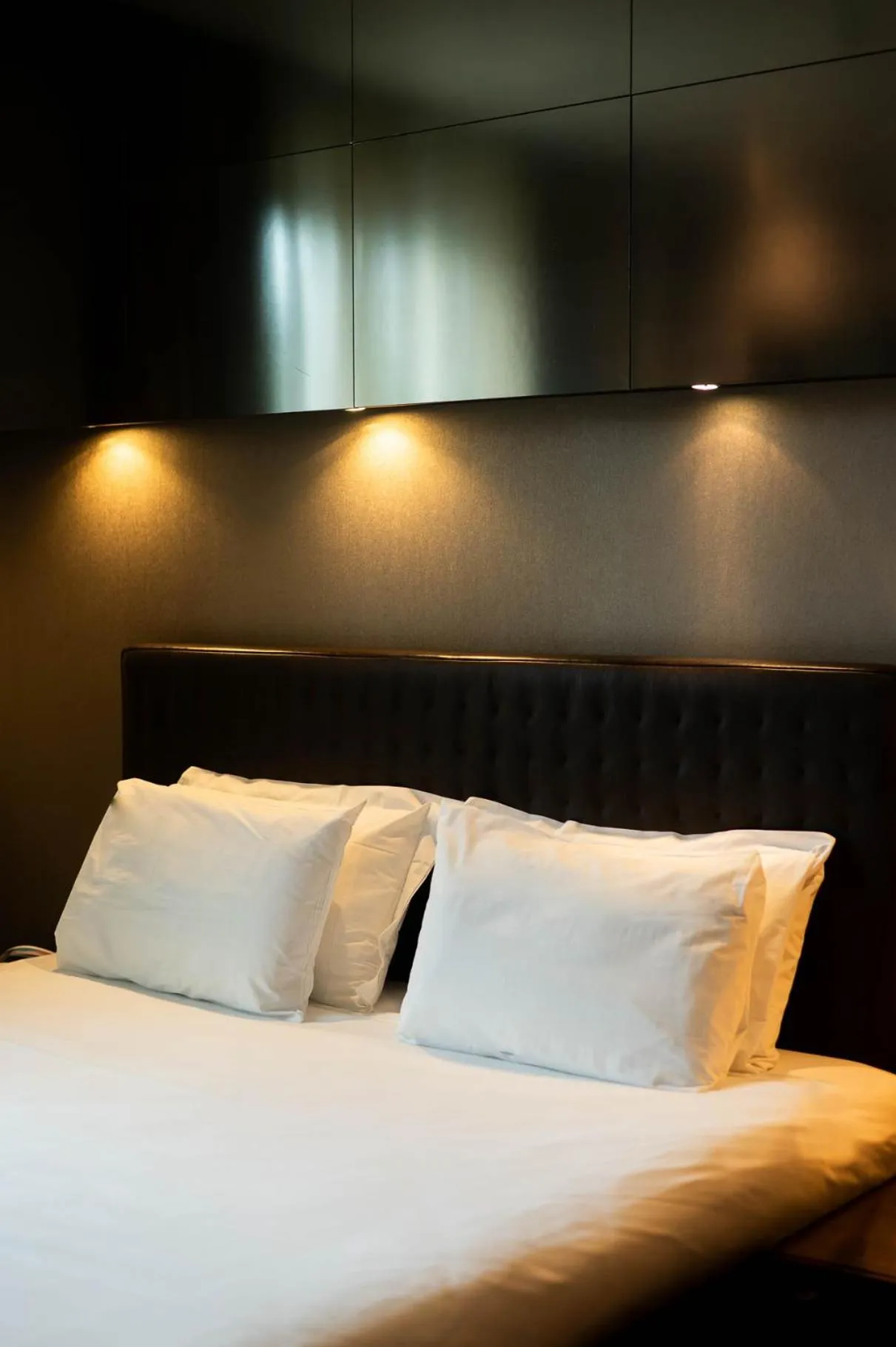 Bed in Axolute Comfort Hotel Como Cantù