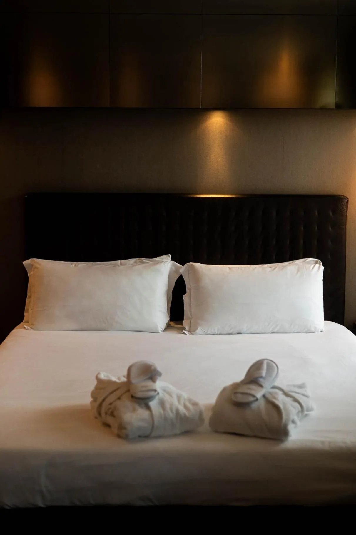 Bed in Axolute Comfort Hotel Como Cantù