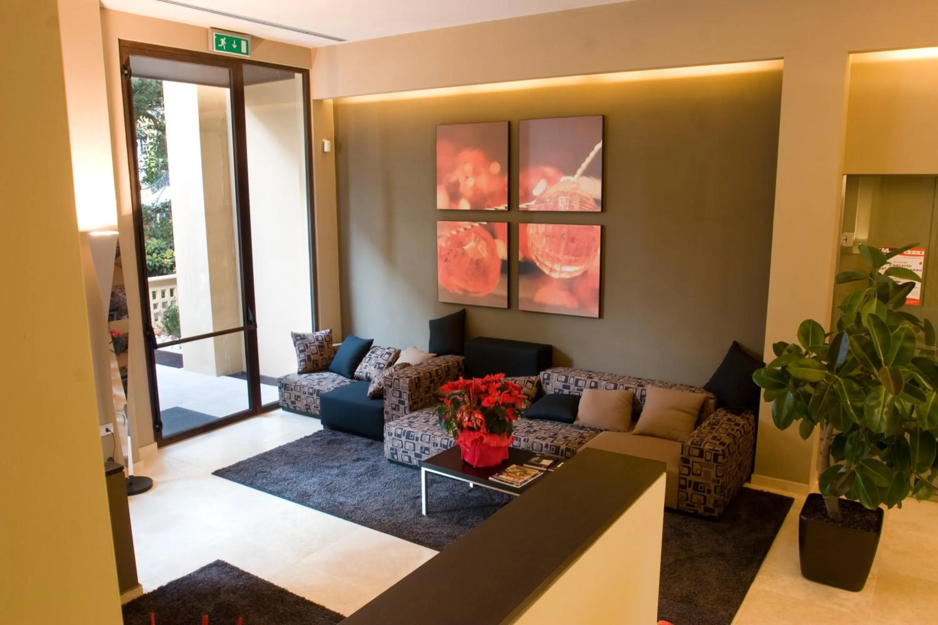 Lobby or reception in UNAHOTELS Villa dei Platani Foligno