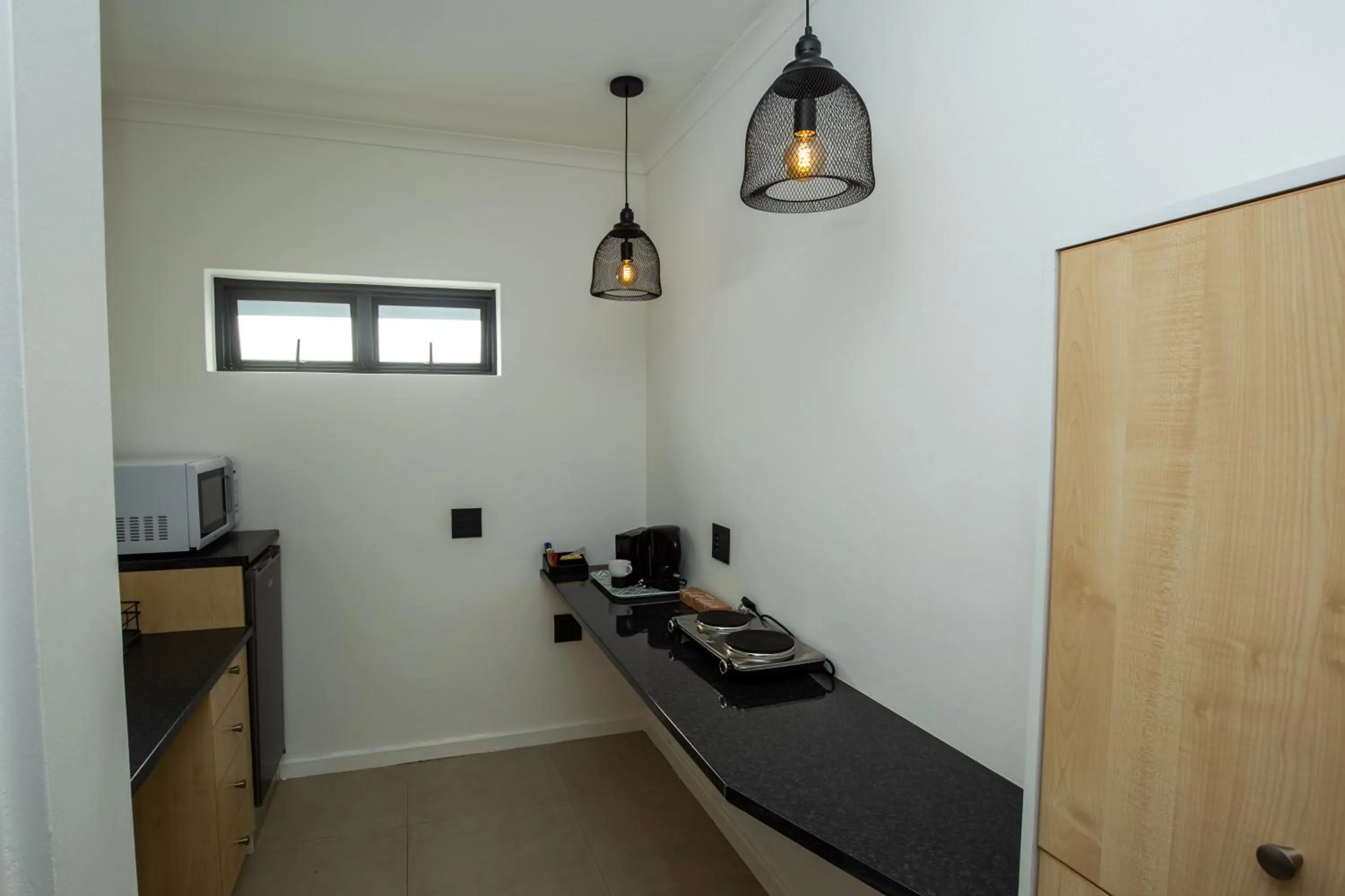 Kitchen or kitchenette in Casa iLanga guesthouse