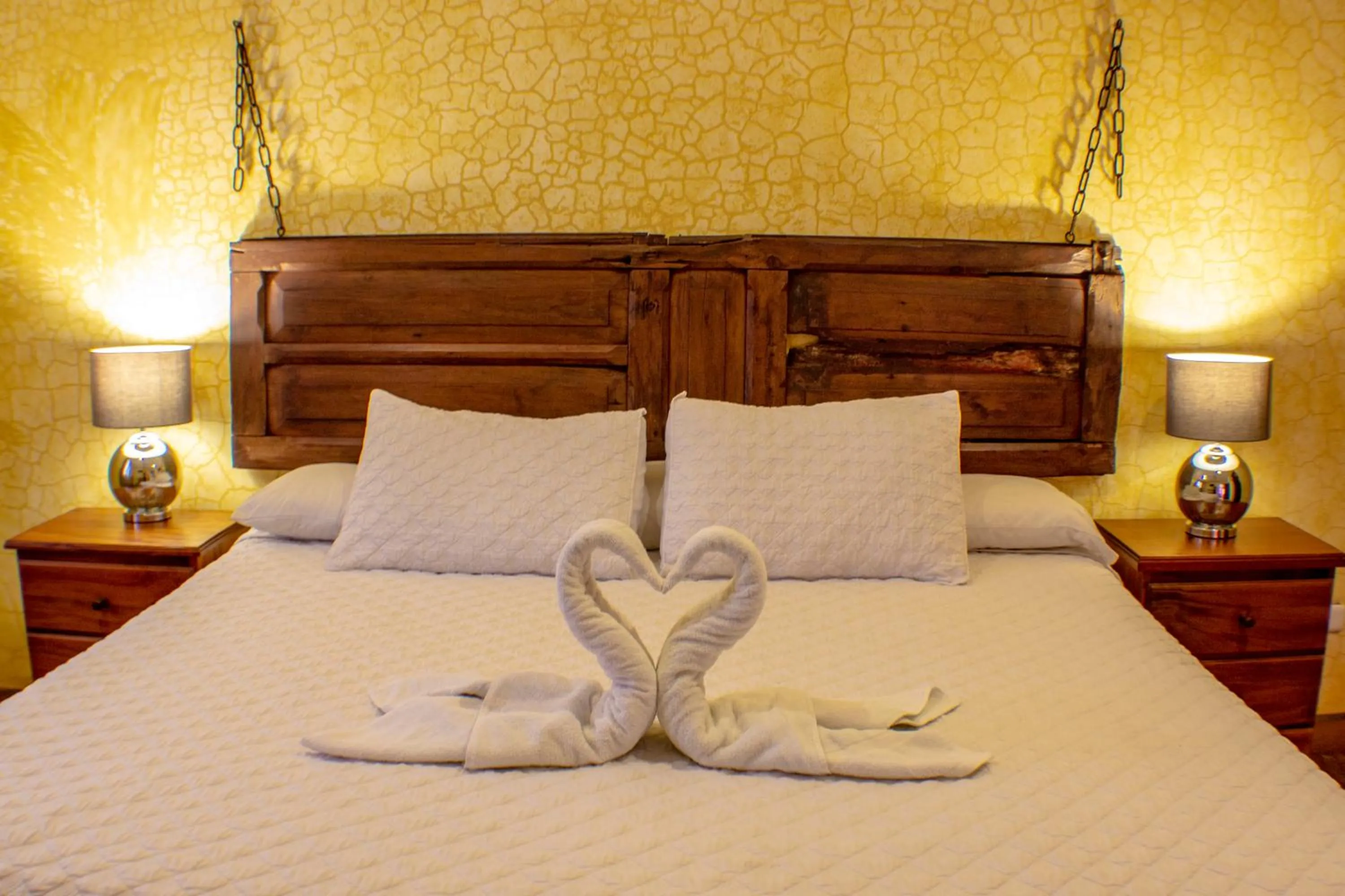 Bed in Casa Mia Hotel