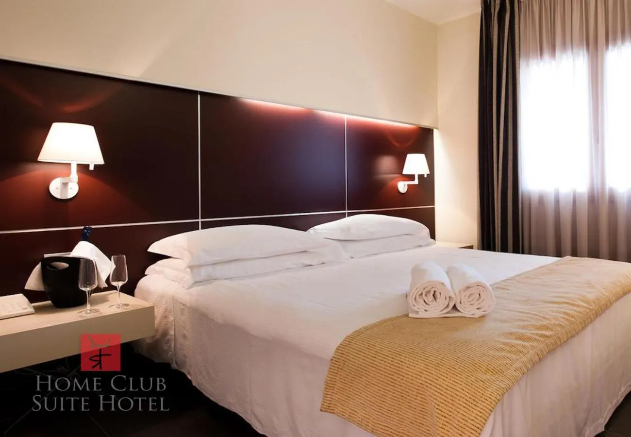 Bedroom, Bed in Home Club Suite Hotel