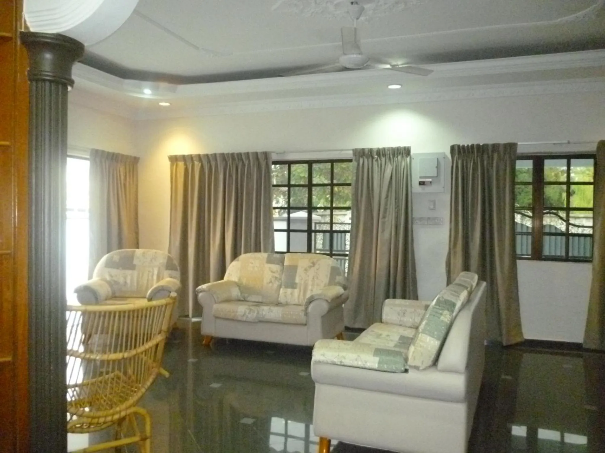 Communal lounge/ TV room in G Six Hotel