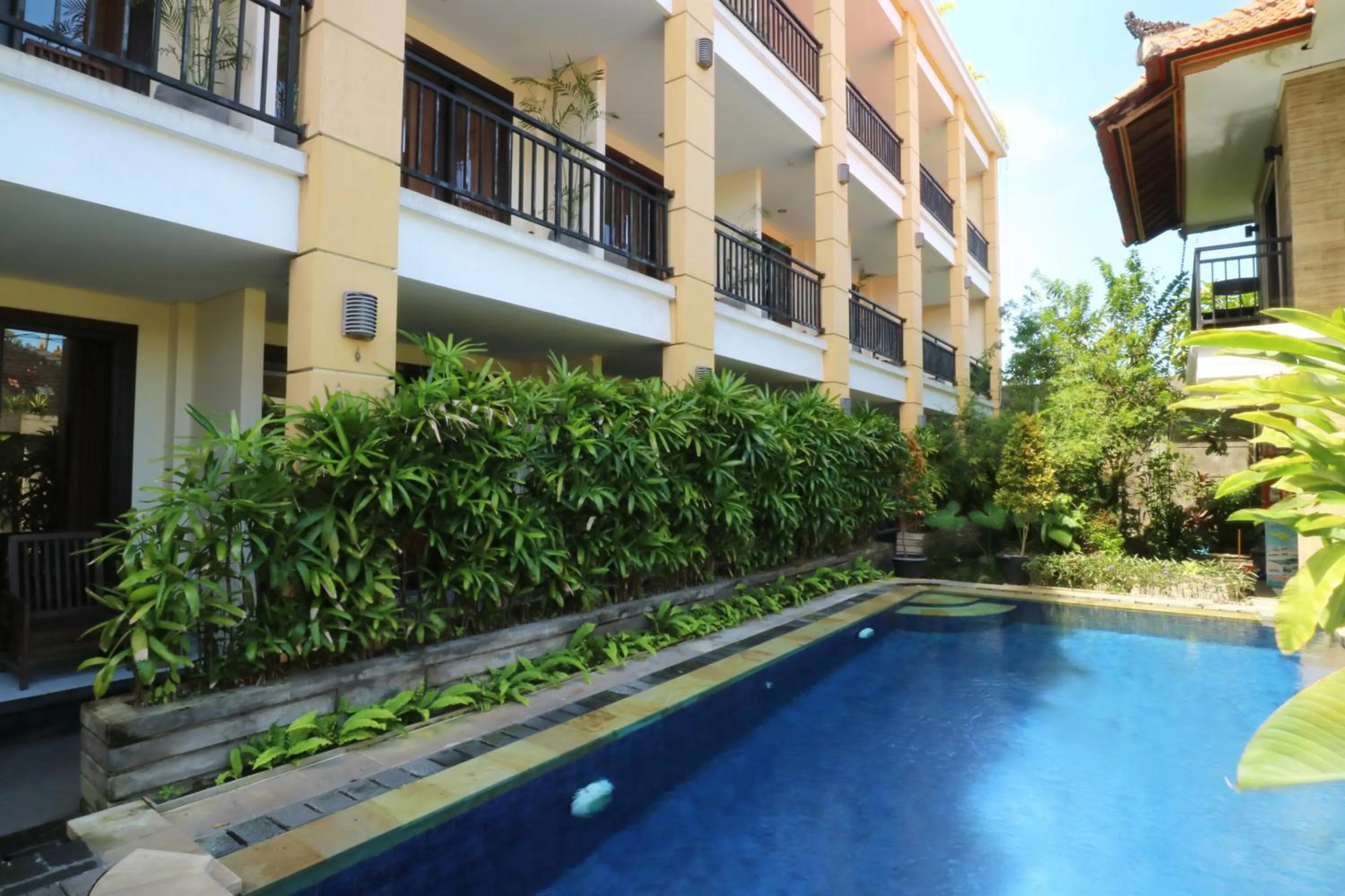Swimming pool in Kondra Premiere Guest House Kuta