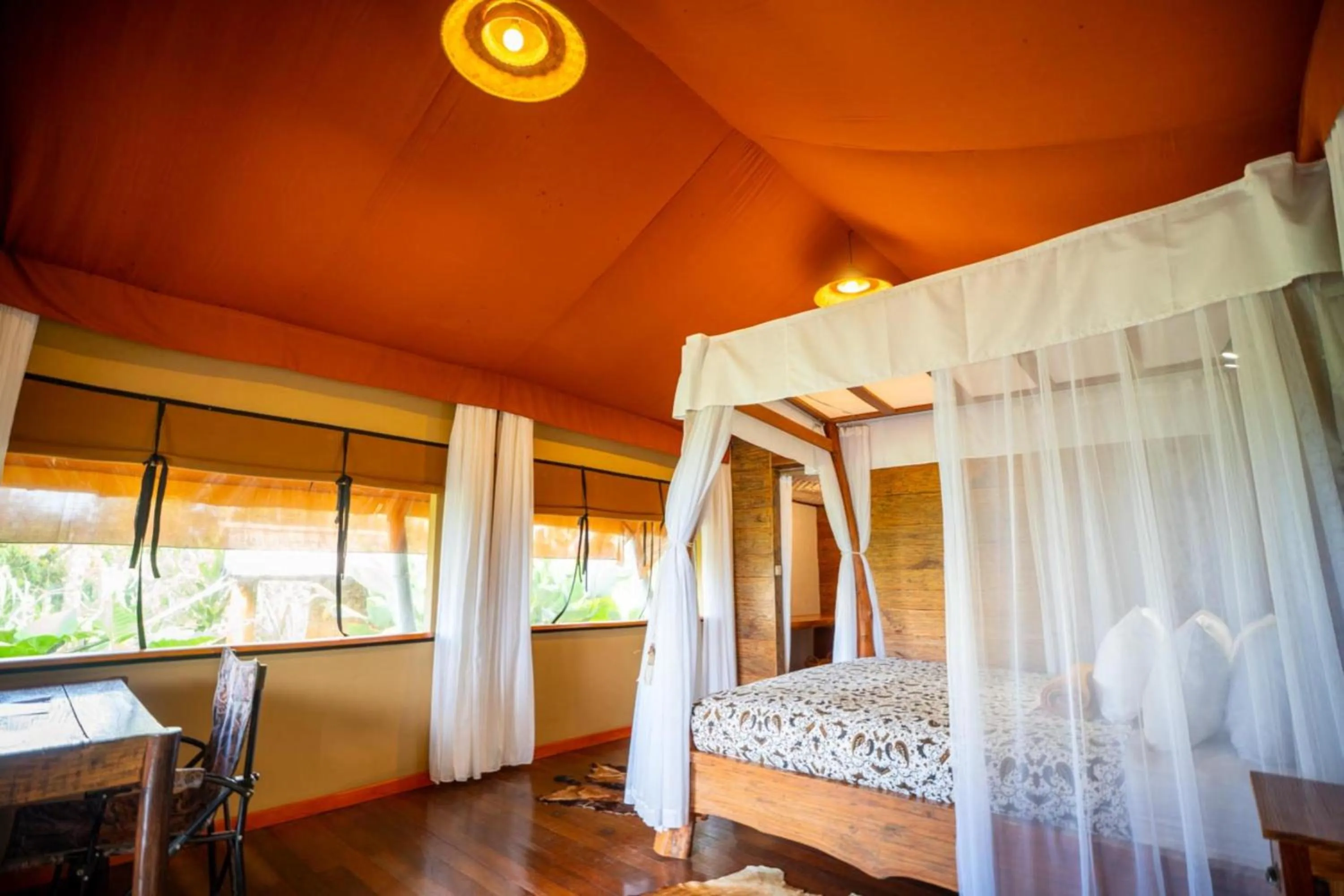 Bed in Sang Giri Mountain Tent Resort