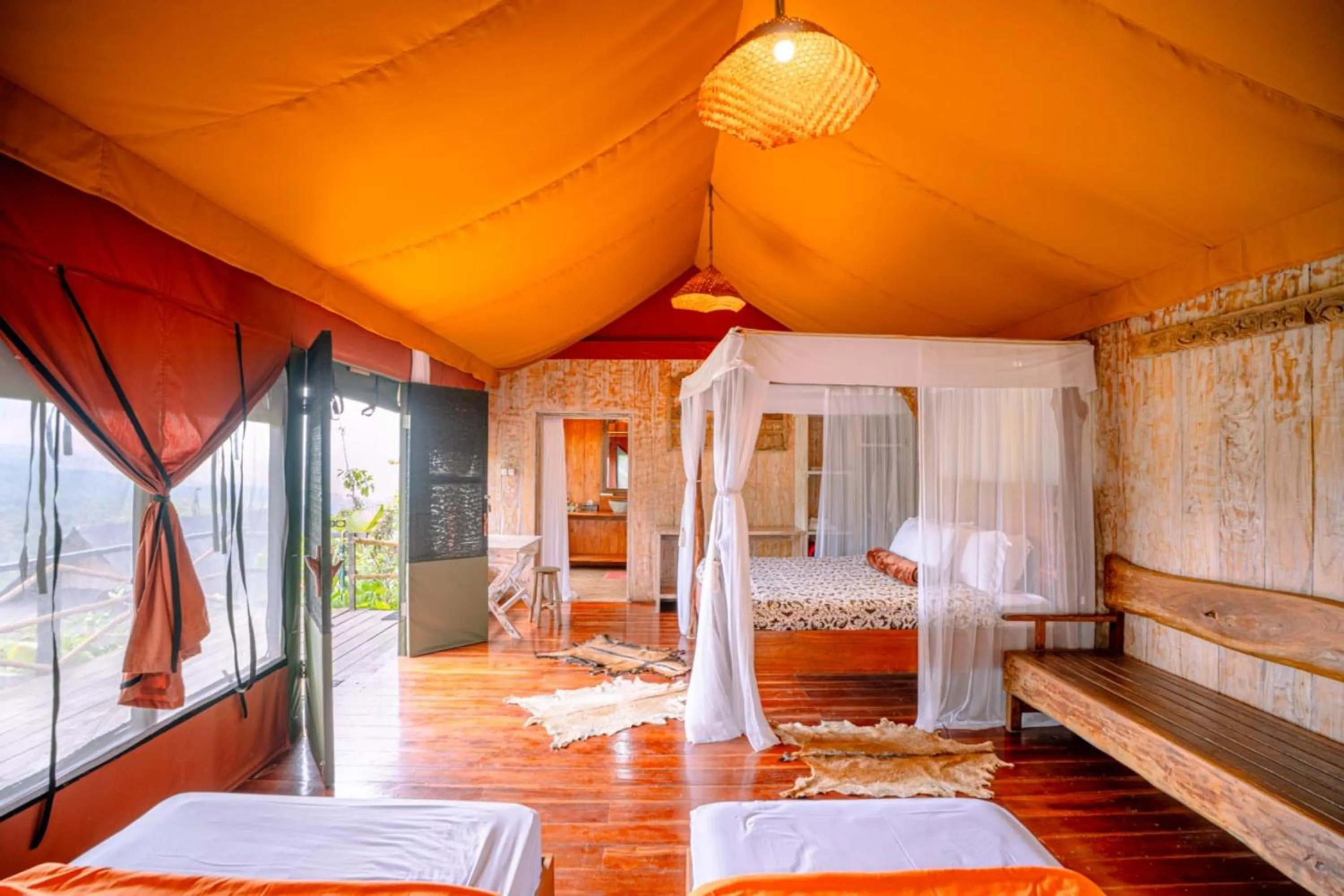 Bed in Sang Giri Mountain Tent Resort