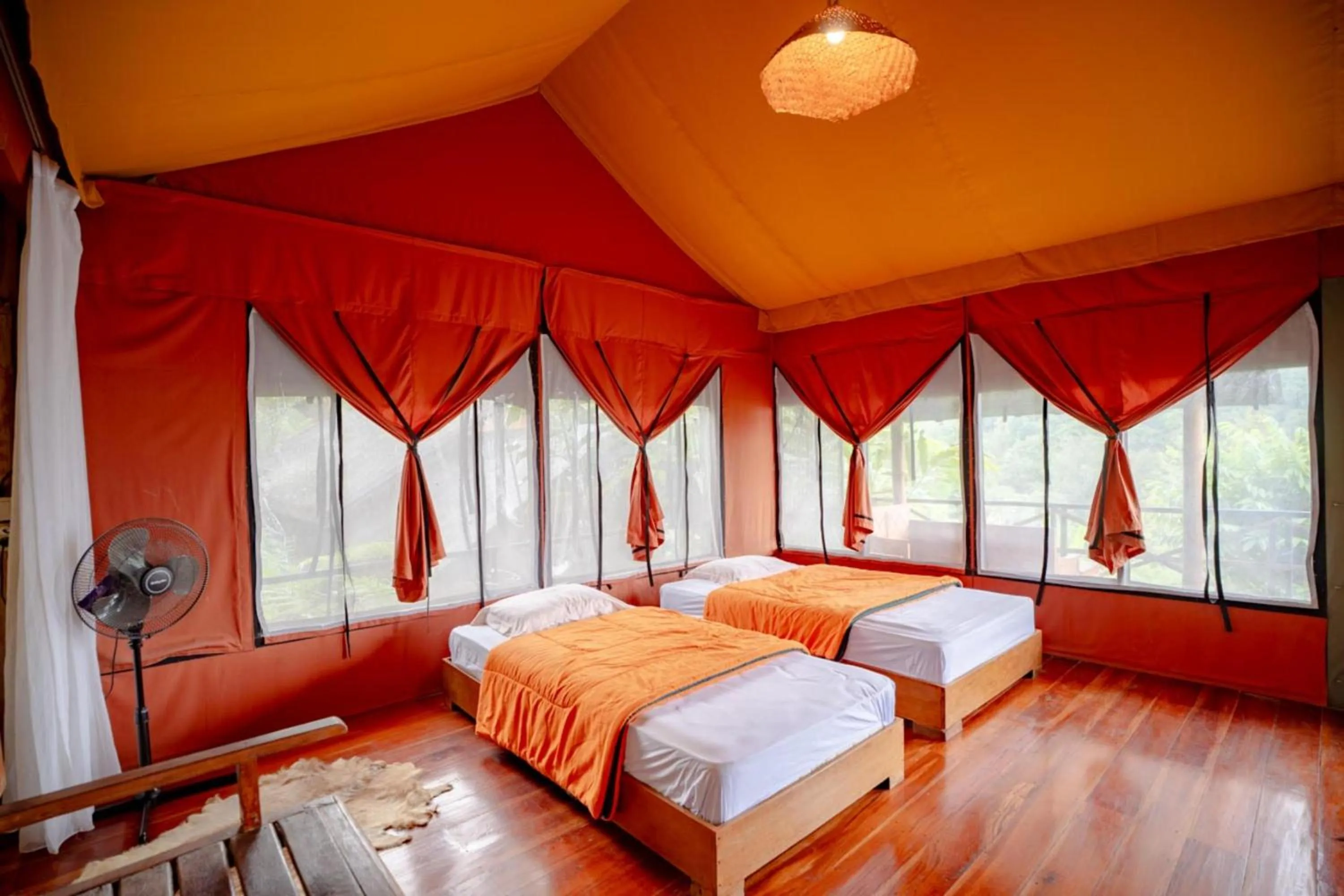 Bed in Sang Giri Mountain Tent Resort