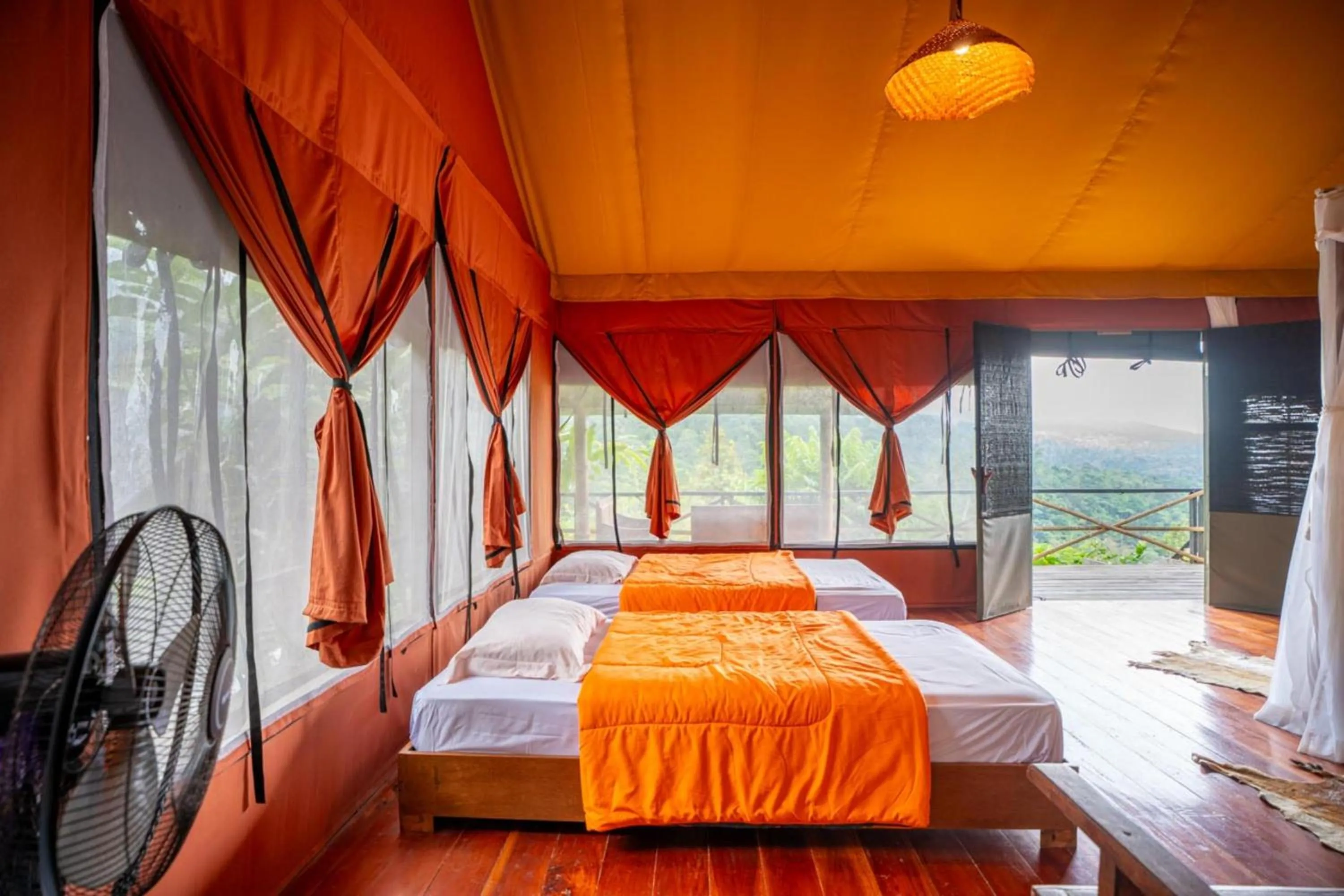 Bed in Sang Giri Mountain Tent Resort