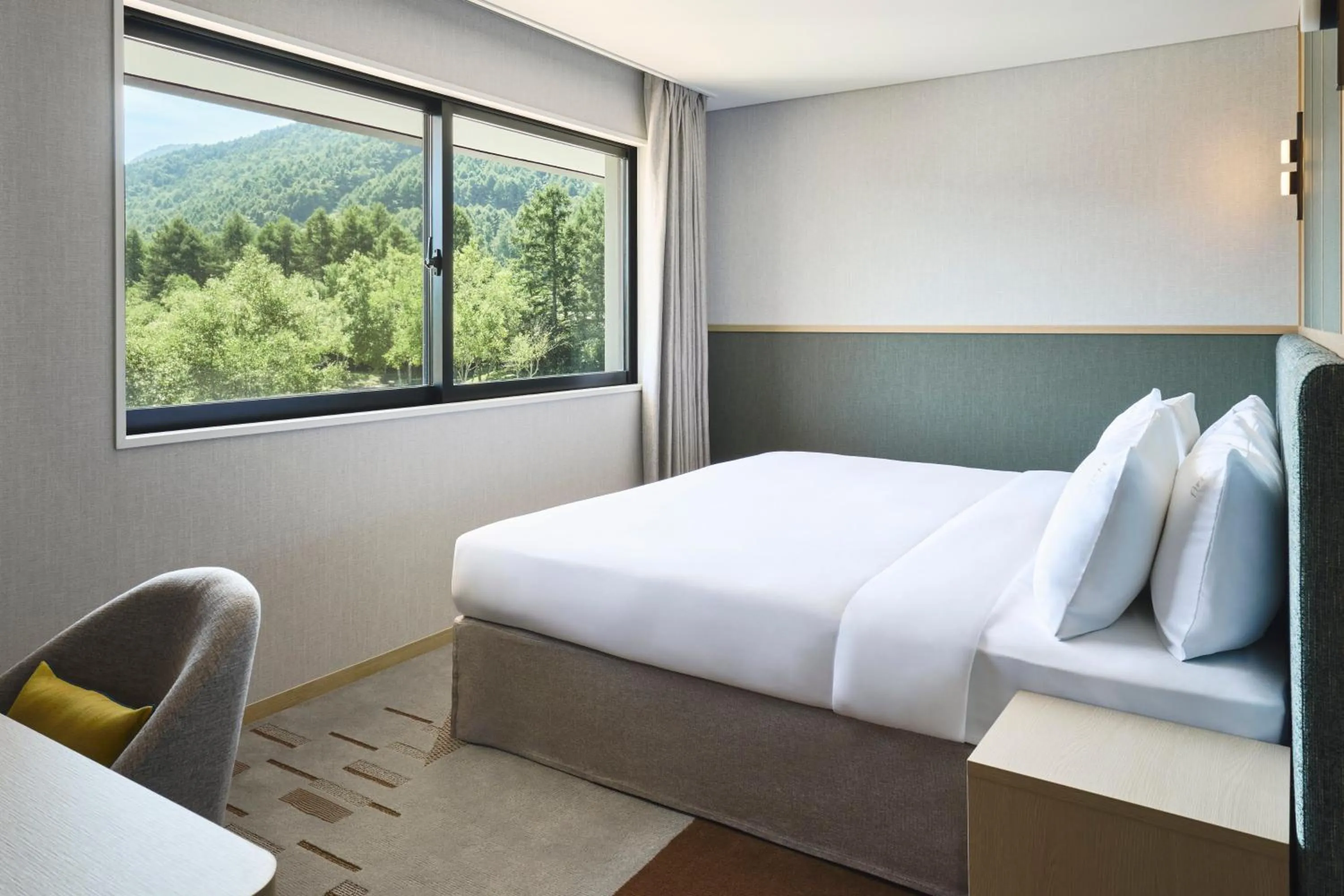 Photo of the whole room, Bed in ANA Holiday Inn Resort Karuizawa by IHG