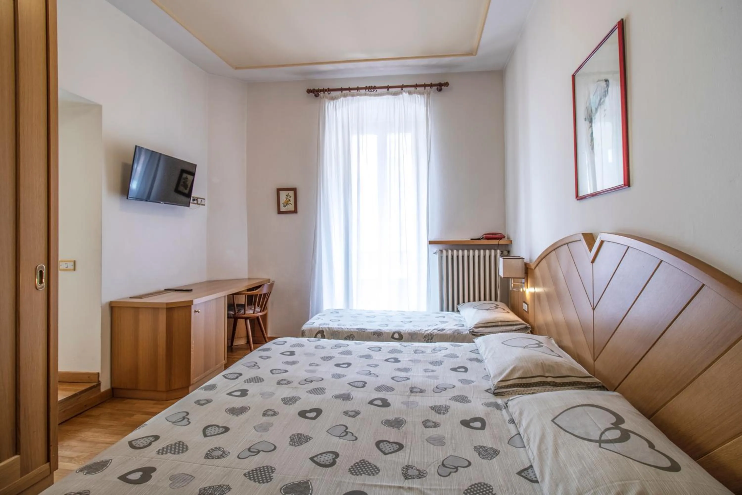 Bedroom, Bed in Hotel Pinzolo-Dolomiti