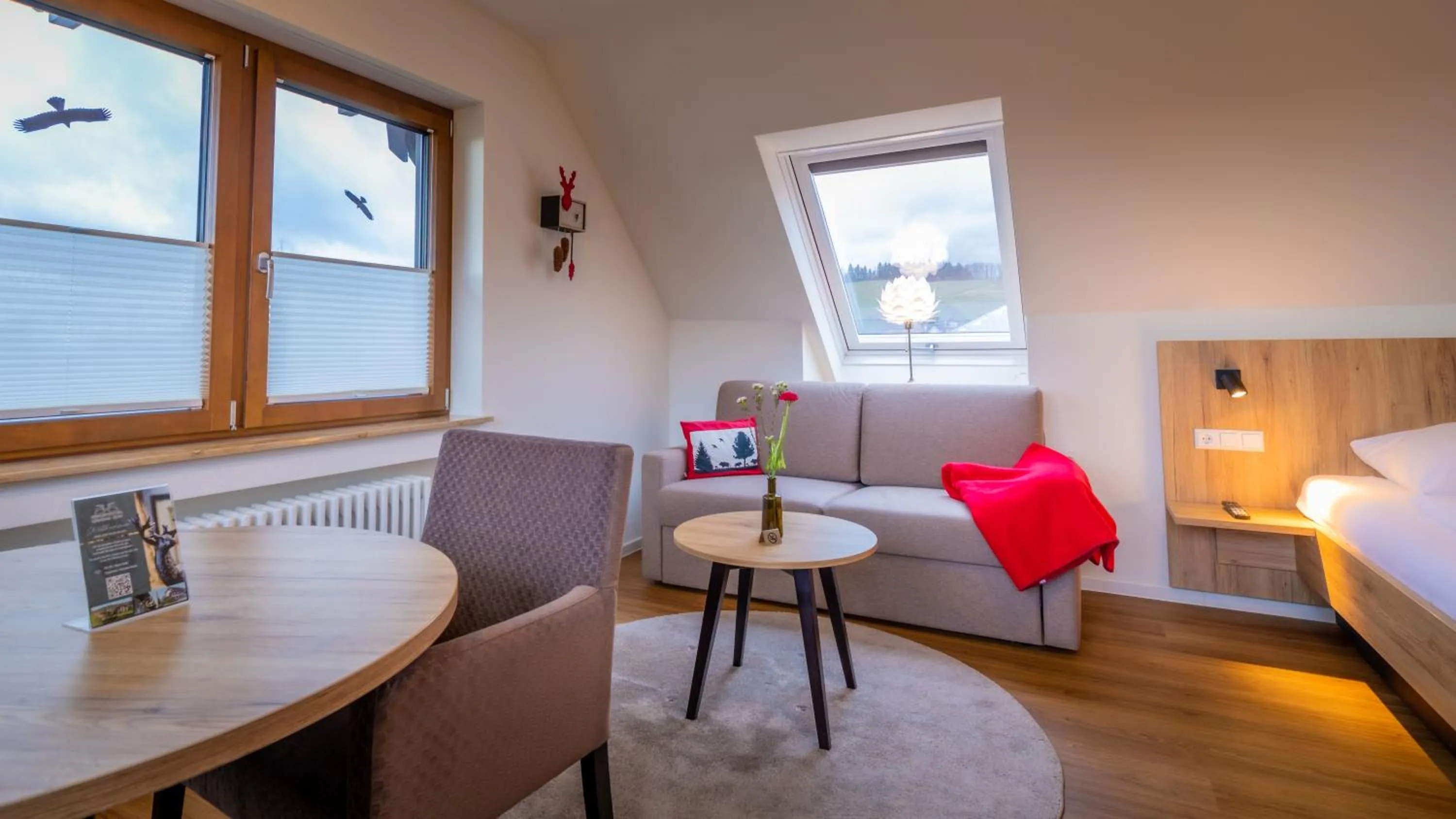 Living room, Bed in Gasthaus Hirschenstube & Gästehaus Gehri