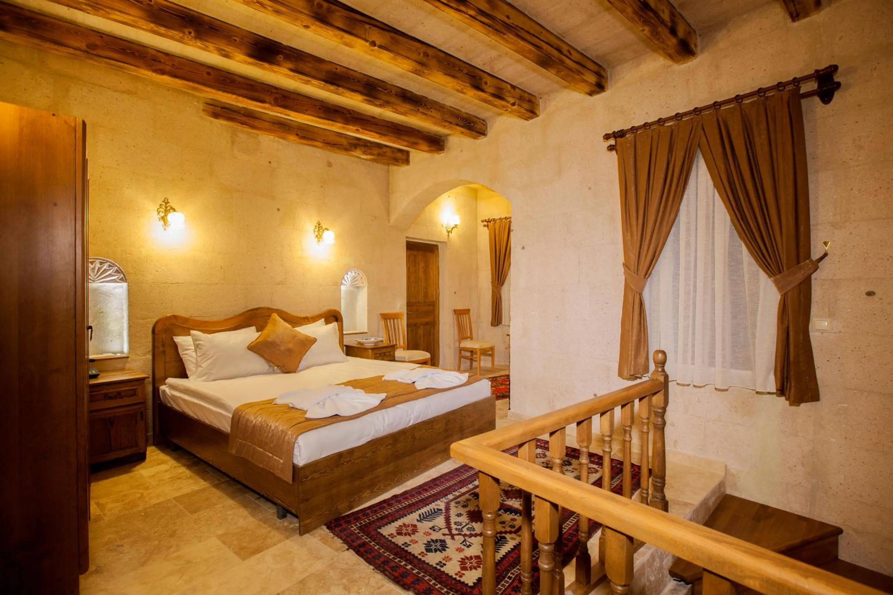 Photo of the whole room, Bed in Magic Cave House