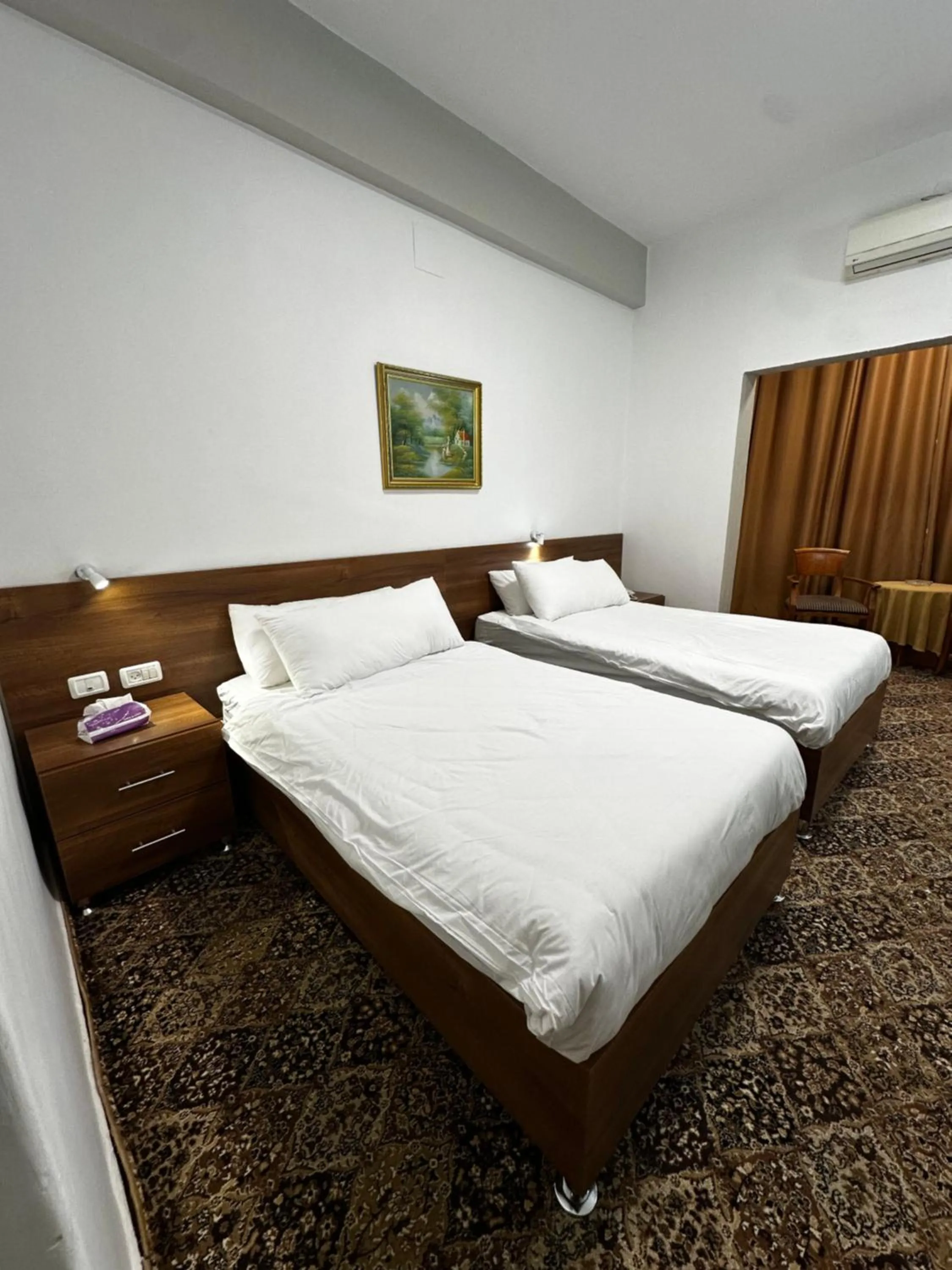 Bed in Shepherd Hotel