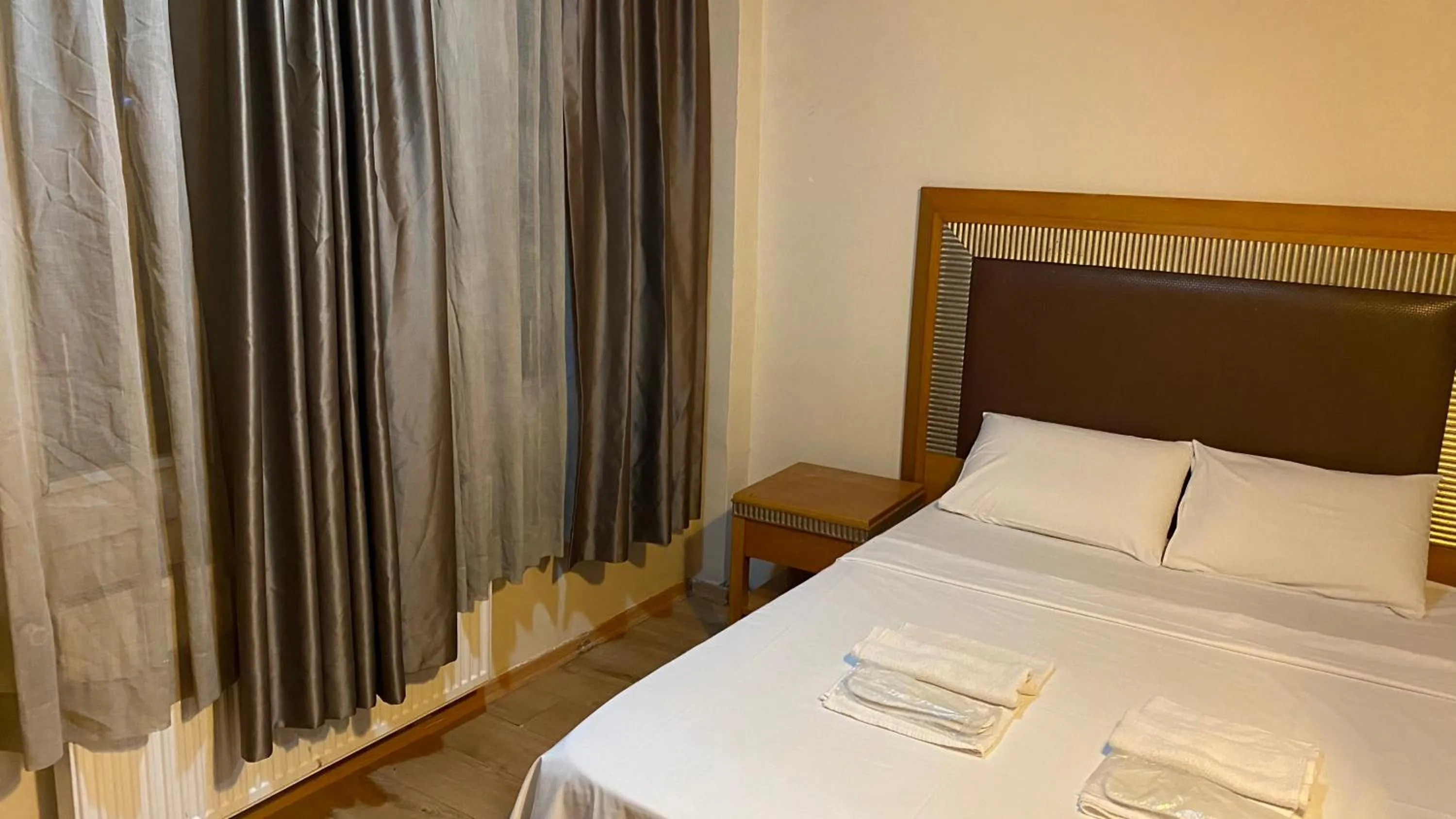 Bed in Herton Boutique Hotel