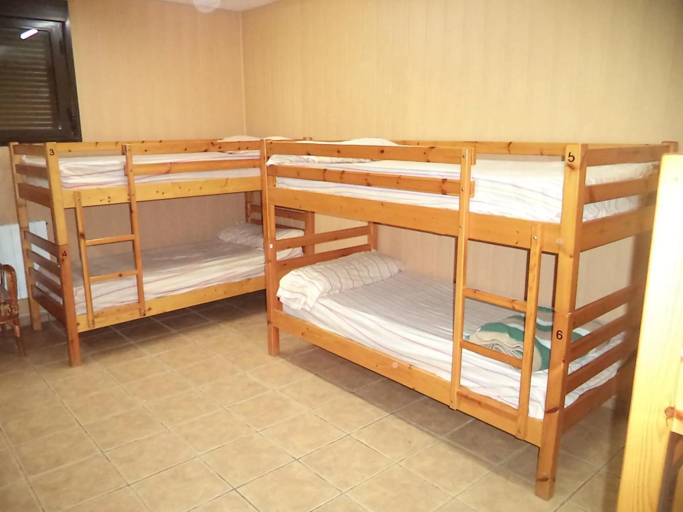 Bed in Albergue de Peregrinos A Santiago