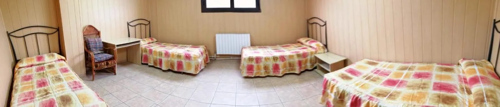 Bed in Albergue de Peregrinos A Santiago