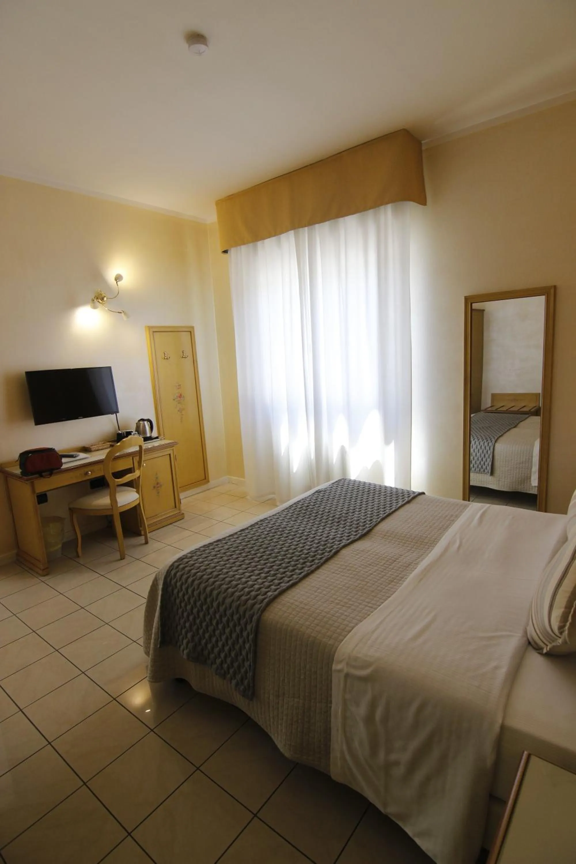 Photo of the whole room, Bed in Piccolo Hotel Nogara